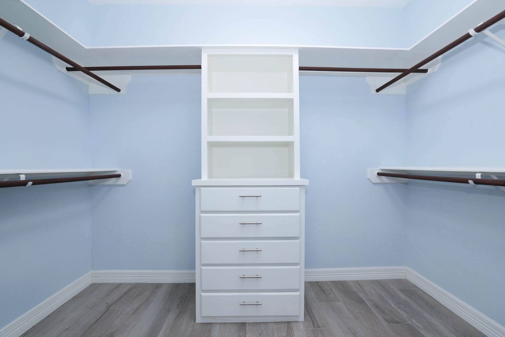 18302 Rittenhouse Park Court, Spring, TX 77379 One of two primary closets with built ins and fresh paint.