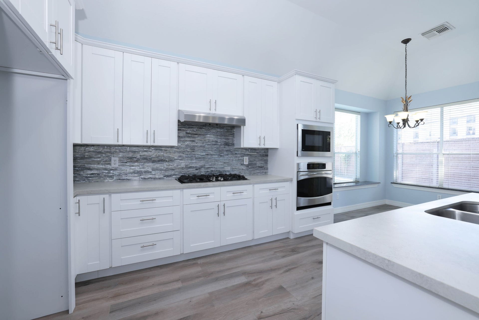 18302 Rittenhouse Park Court, Spring, TX 77379 Thia spacious kitchen has all new soft close cabinets.