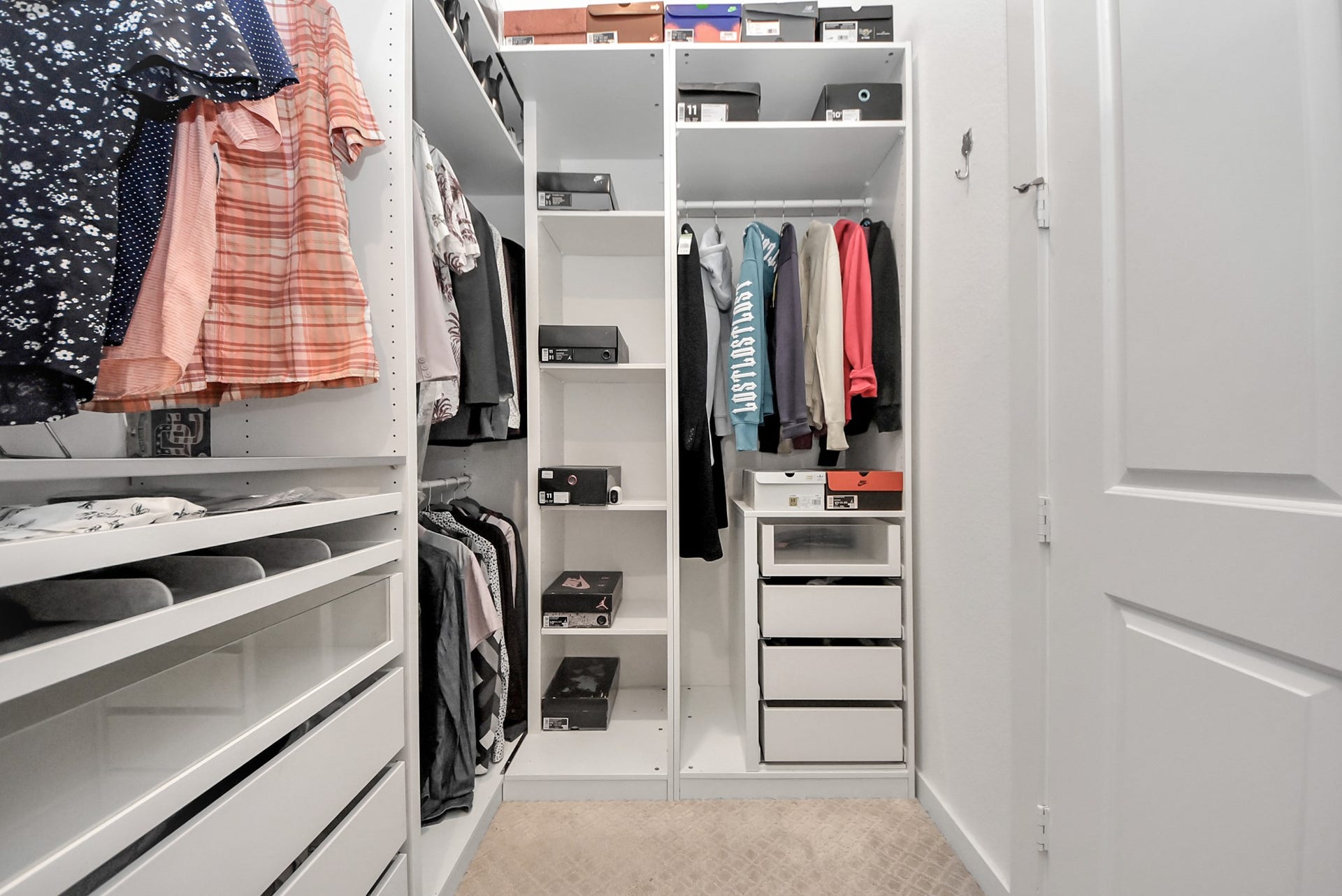10014 Galileo Lane, Iowa Colony, TX 77583 Spacious walk-in closet featuring built-in shelving and organized storage.
