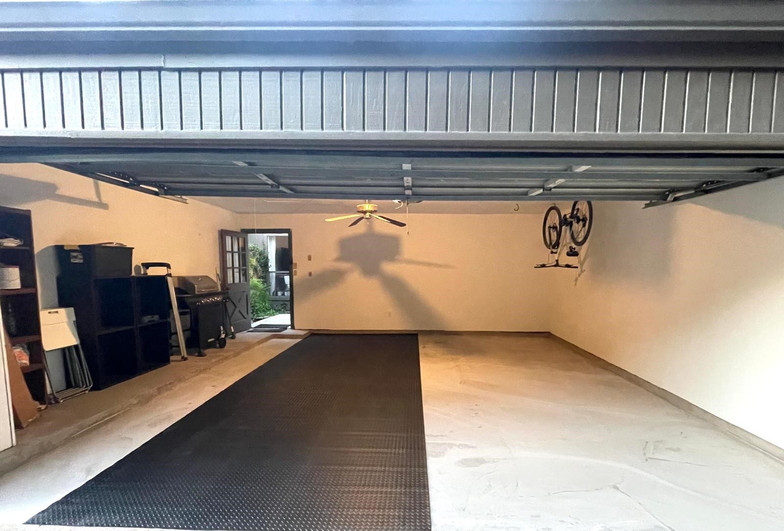 2 car garage, freshly painted and refreshed floor. Garage has a second attic.