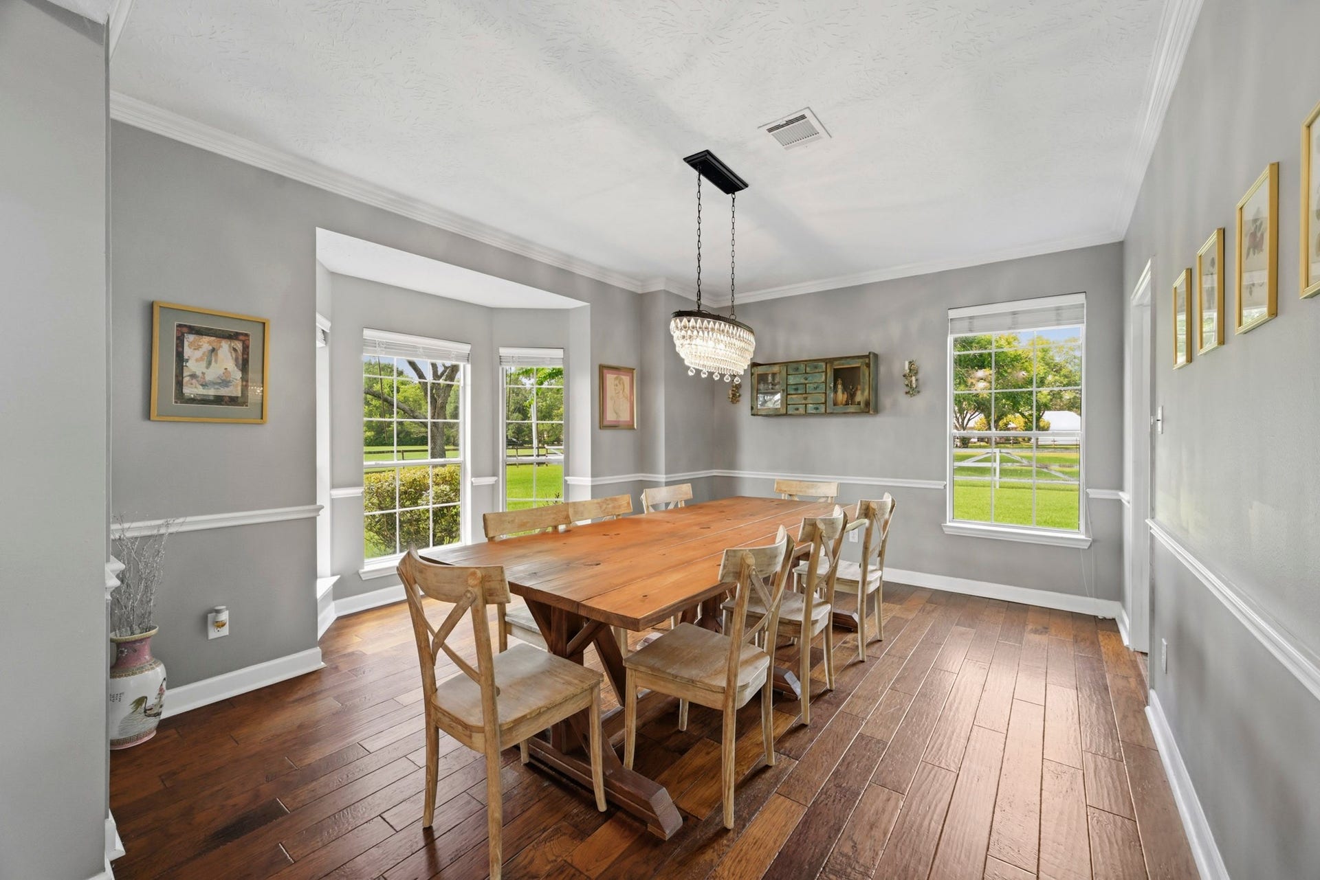5202 Cherry Ridge Road, Richmond, TX 77406 Elegant formal dining room designed for memorable gatherings.