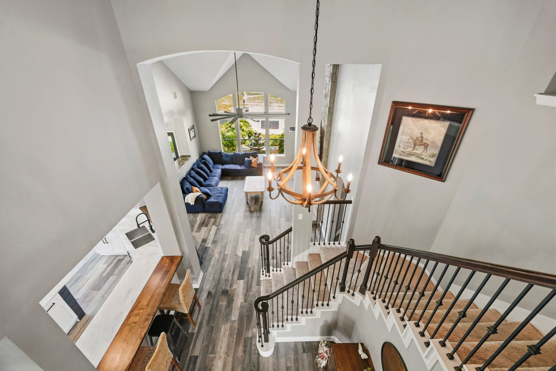 5202 Cherry Ridge Road, Richmond, TX 77406 Open upstairs landing with views of the home's impressive architectural features.