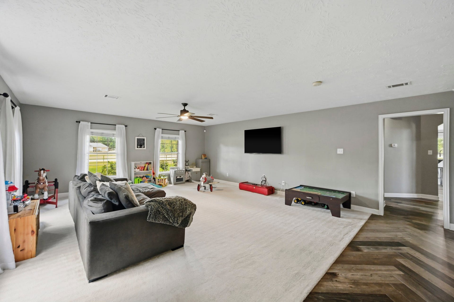 5202 Cherry Ridge Road, Richmond, TX 77406 Game room featuring entertainment space, wine refrigerator, and dry bar area.