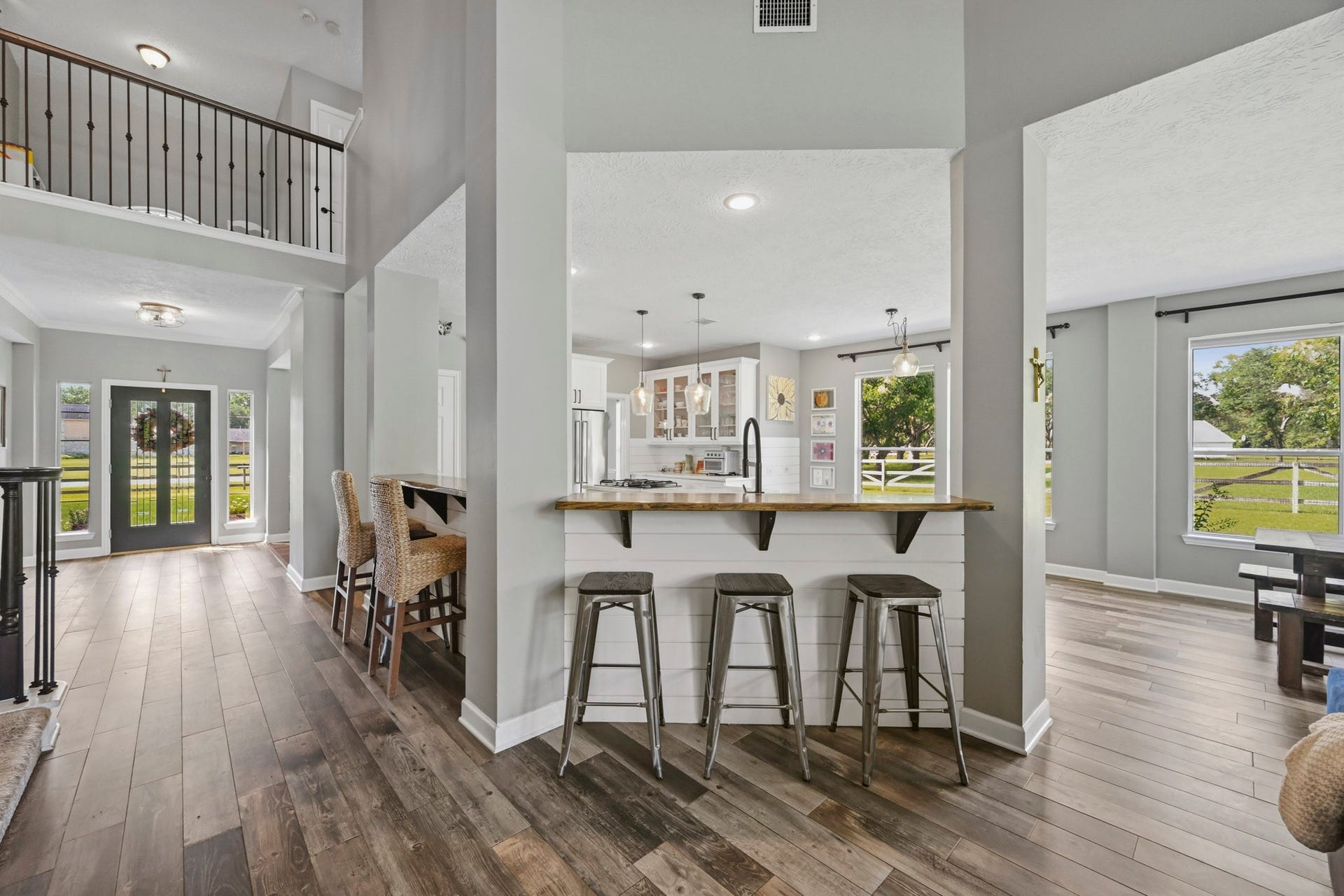 5202 Cherry Ridge Road, Richmond, TX 77406 Generous breakfast bar ideal for casual dining and entertaining.
