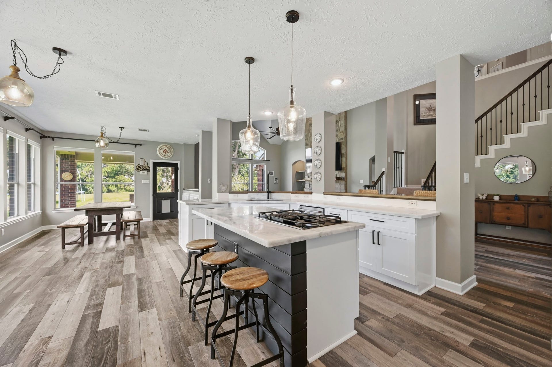 5202 Cherry Ridge Road, Richmond, TX 77406 Open view of the kitchen, breakfast area, and family room.