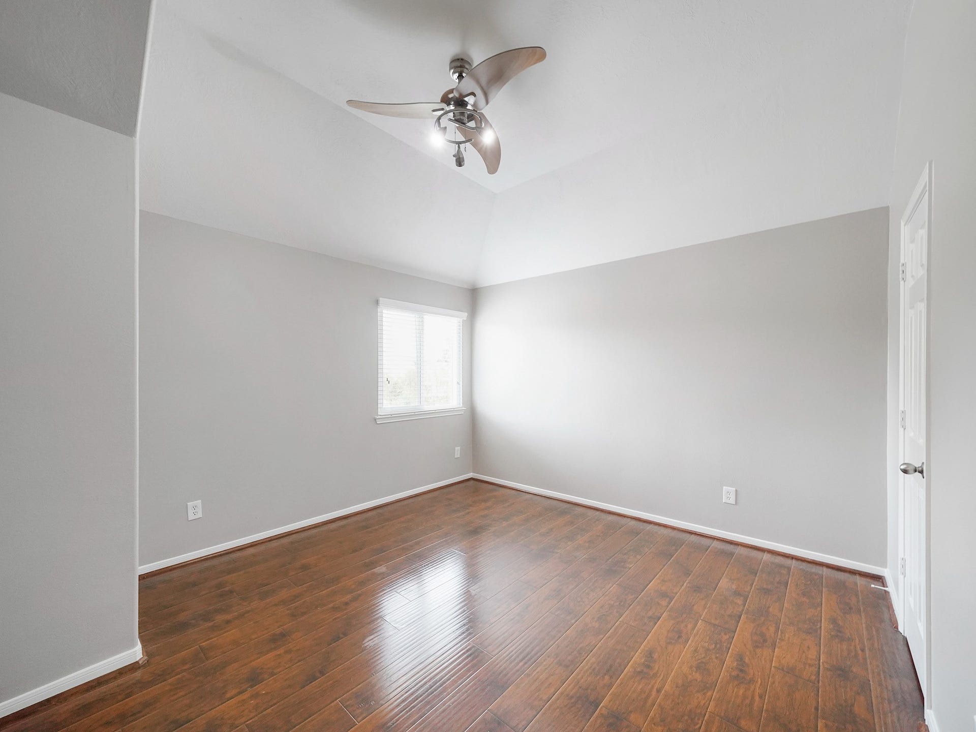Freshly painted and spacious, this secondary bedroom is ready to suit a growing household, guests, or a home office.