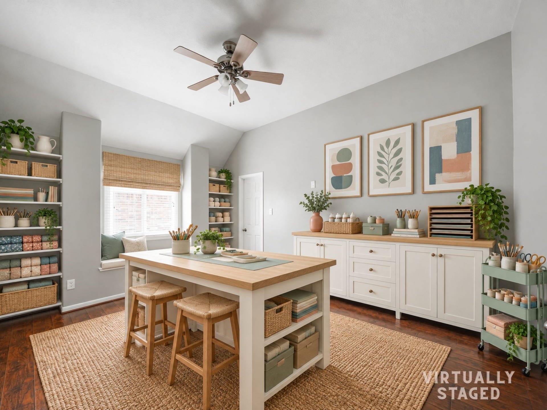 Virtually staged: This secondary bedroom is shown as a bright, organized craft room, highlighting its flexibility for hobbies, creative work, or everyday living.