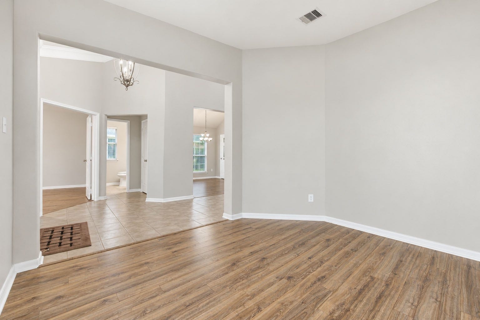Office & Bonus Room: Dedicated office near the entrance, plus a separate versatile bonus room ideal as a receiving/sitting area, flex room, or additional living space.