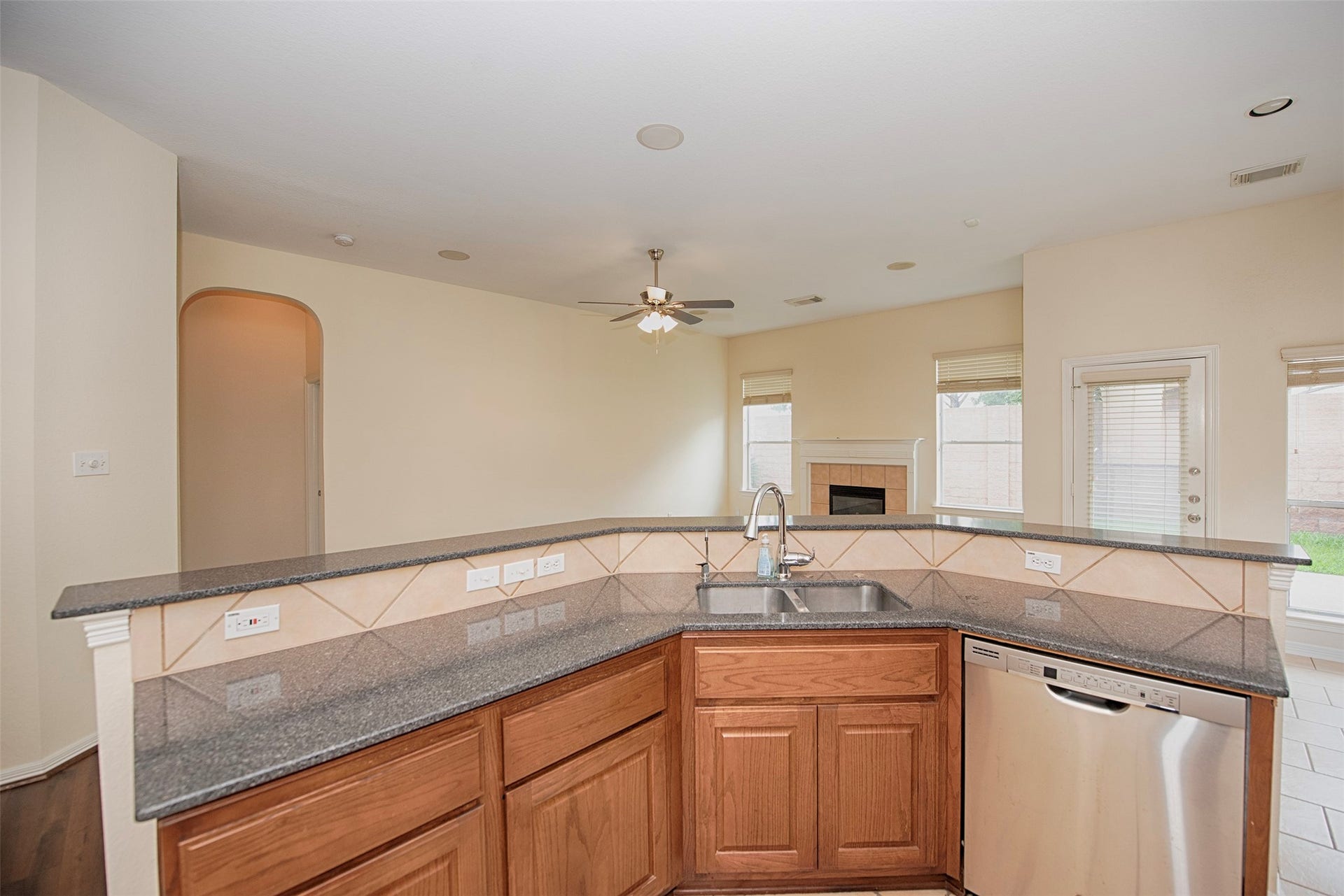 A view of the kitchen open to the family room.