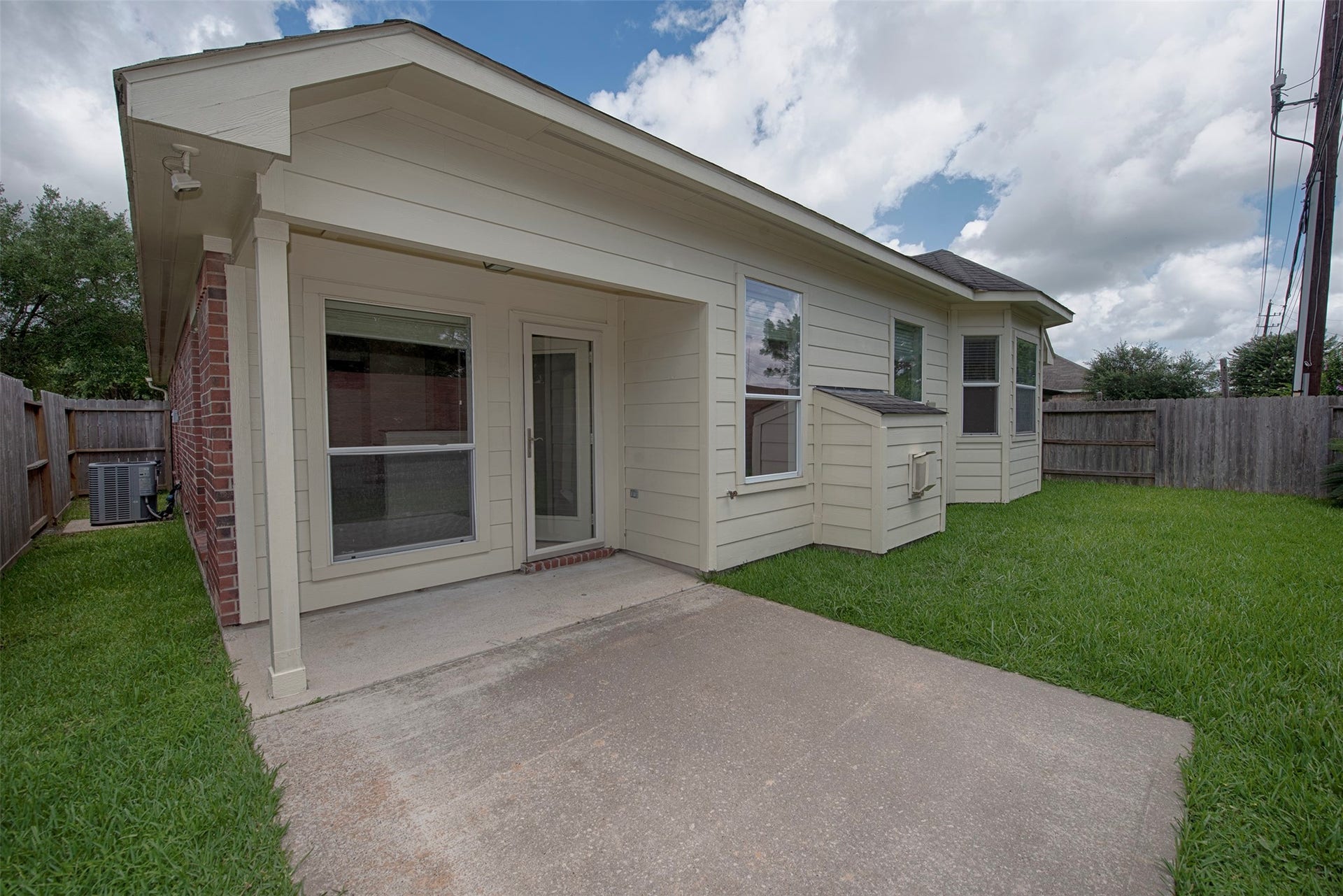 A view of the spacious back patio for outdoor entertaining.