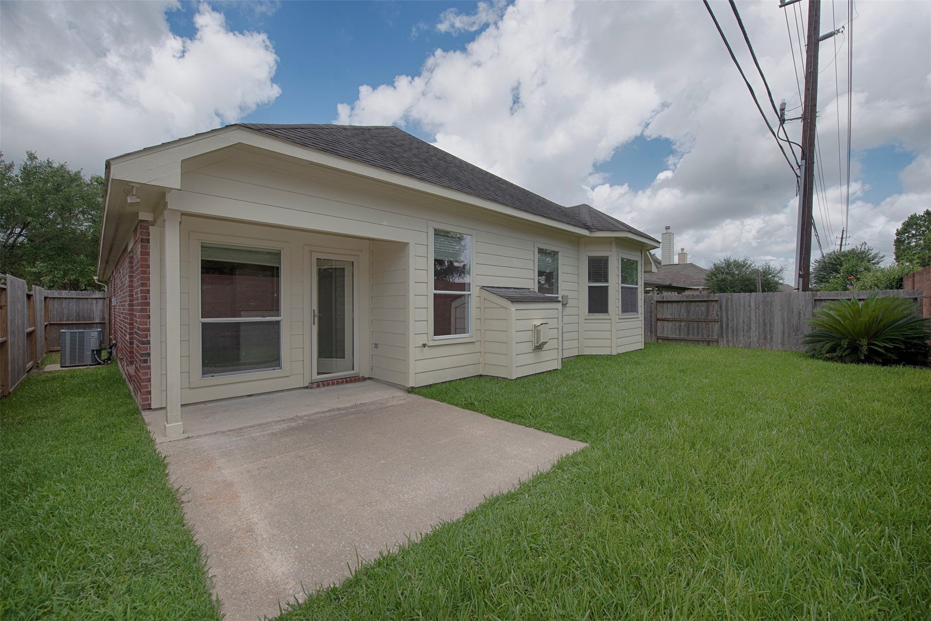 A closer look at the back patio. Plenty of room for your large outdoor furniture.  Great pride of ownership is obvious with this home. Inside and out.
