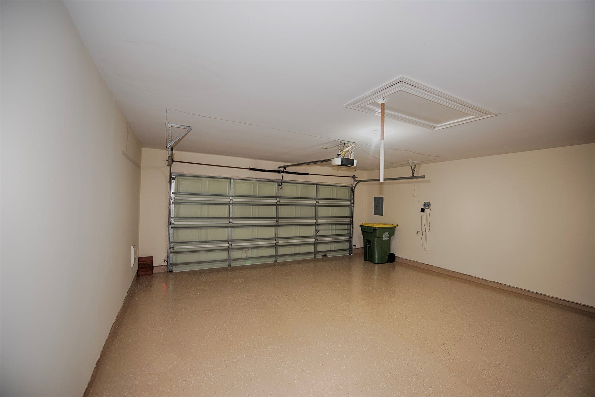 Garage updated with gorgeous epoxy floors.