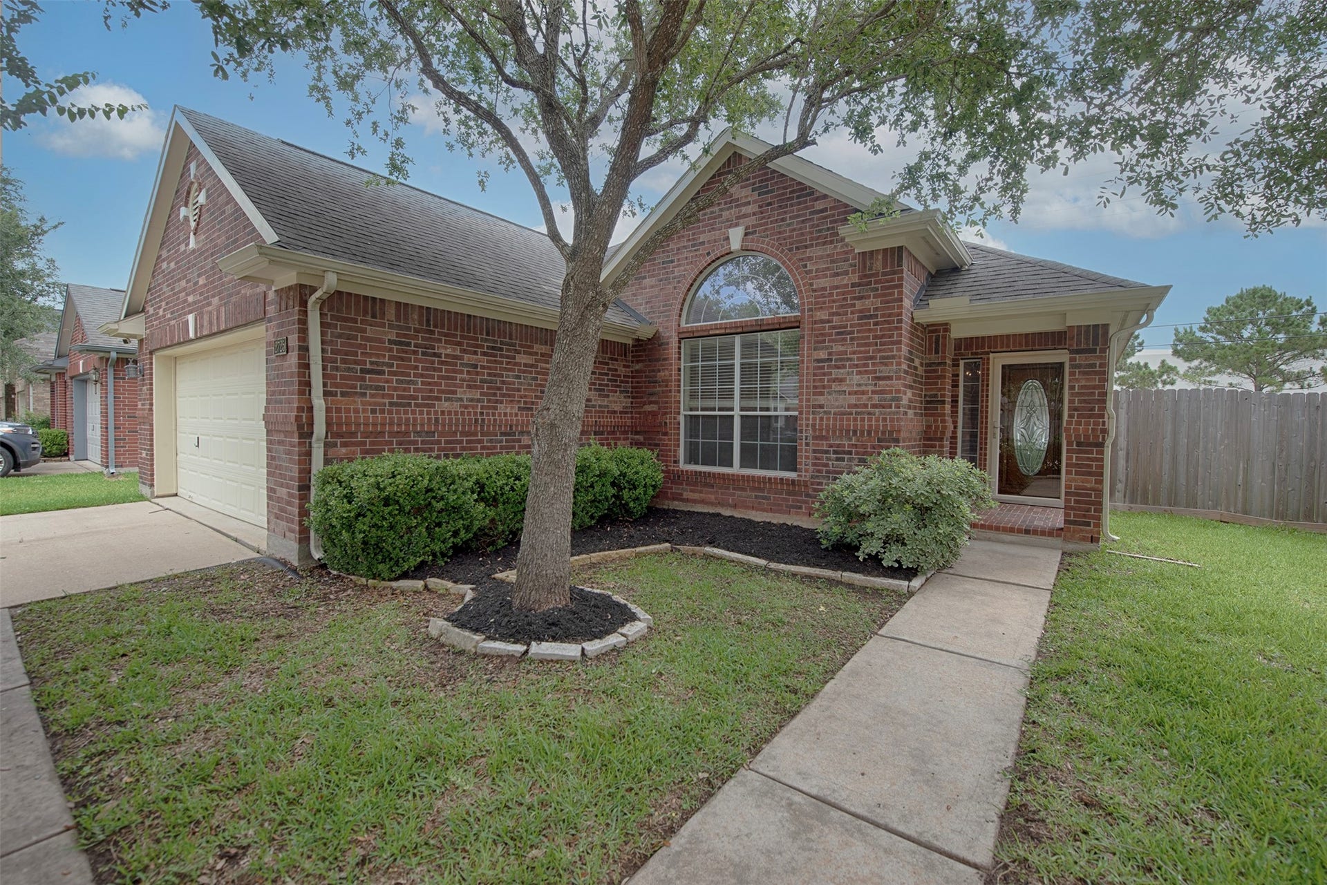 A closer view of the home with inviting walkway.