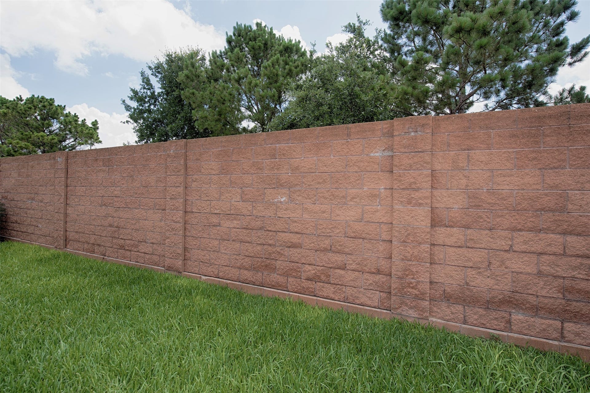 Wonderful brick back fence provides great privacy.