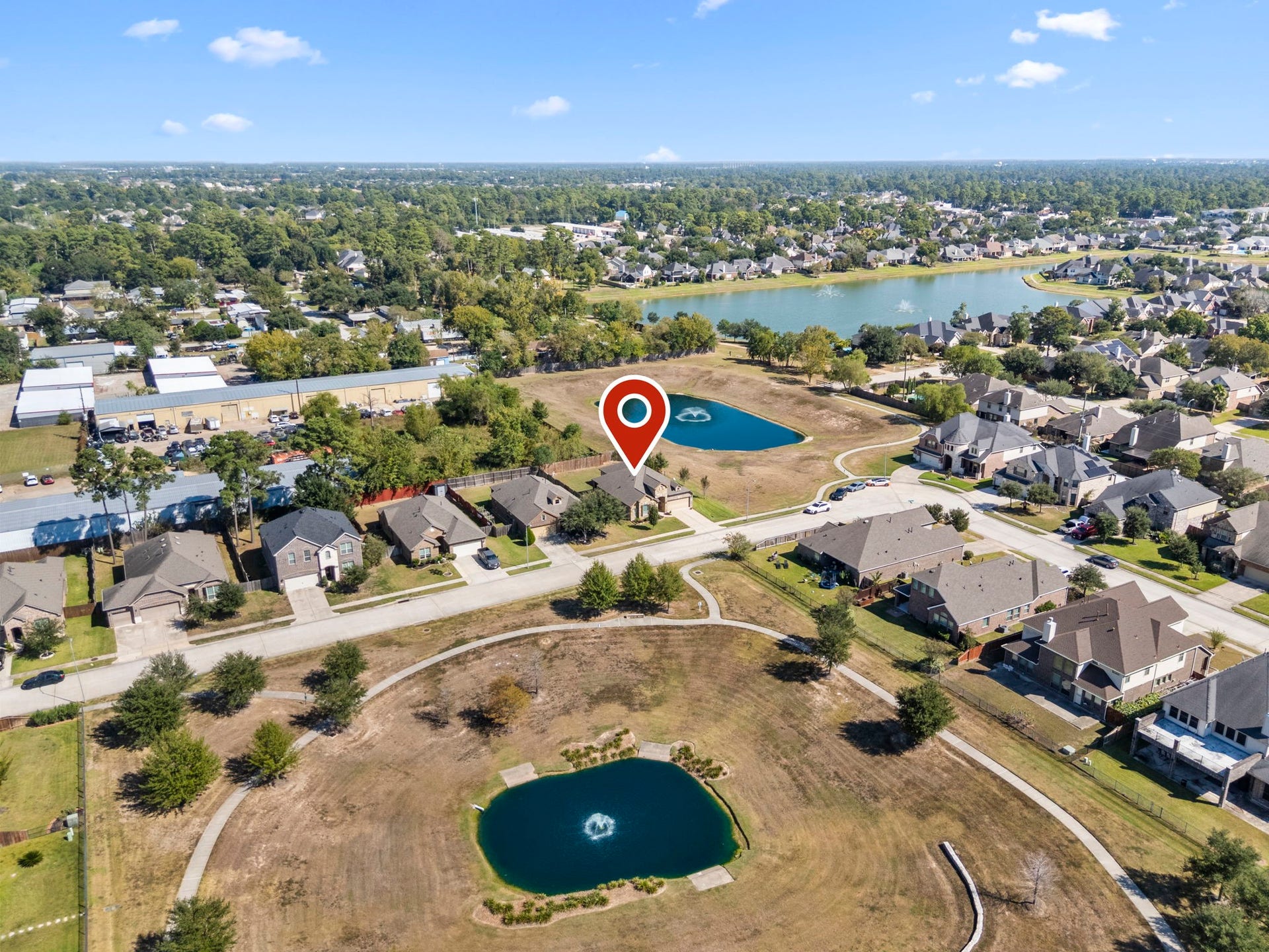 19610 Crystal Ivy Lane, Spring, TX 77388 Walking paths at every turn with beautiful nature and water views from all around.