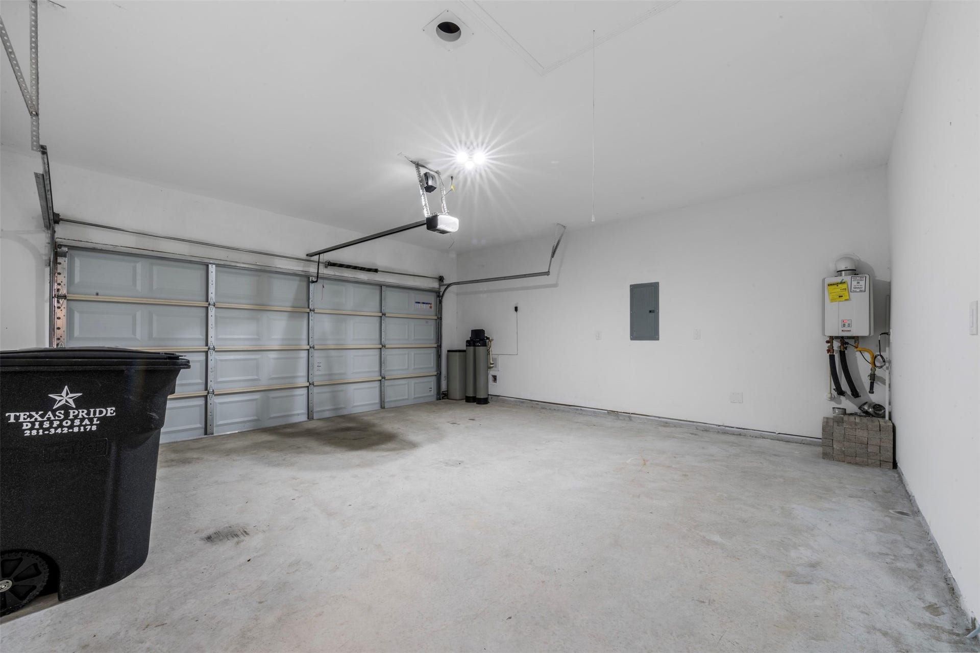 25814 Northpark Pine Drive, Porter, TX 77365 Two car garage with garage door opener, WHOLE HOUSE water filtration system and On-Demand water heater