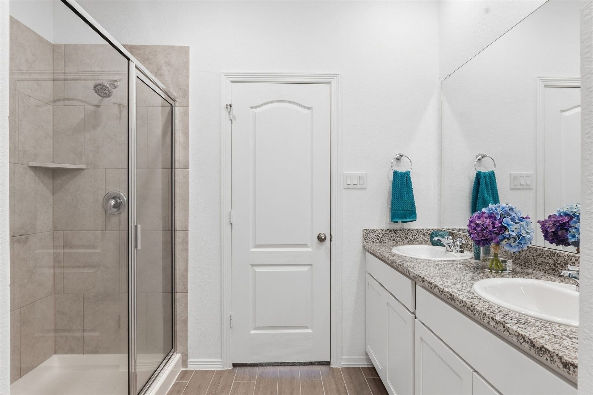 25814 Northpark Pine Drive, Porter, TX 77365 Primary en-suite with double vanity, large shower, granite countertops.