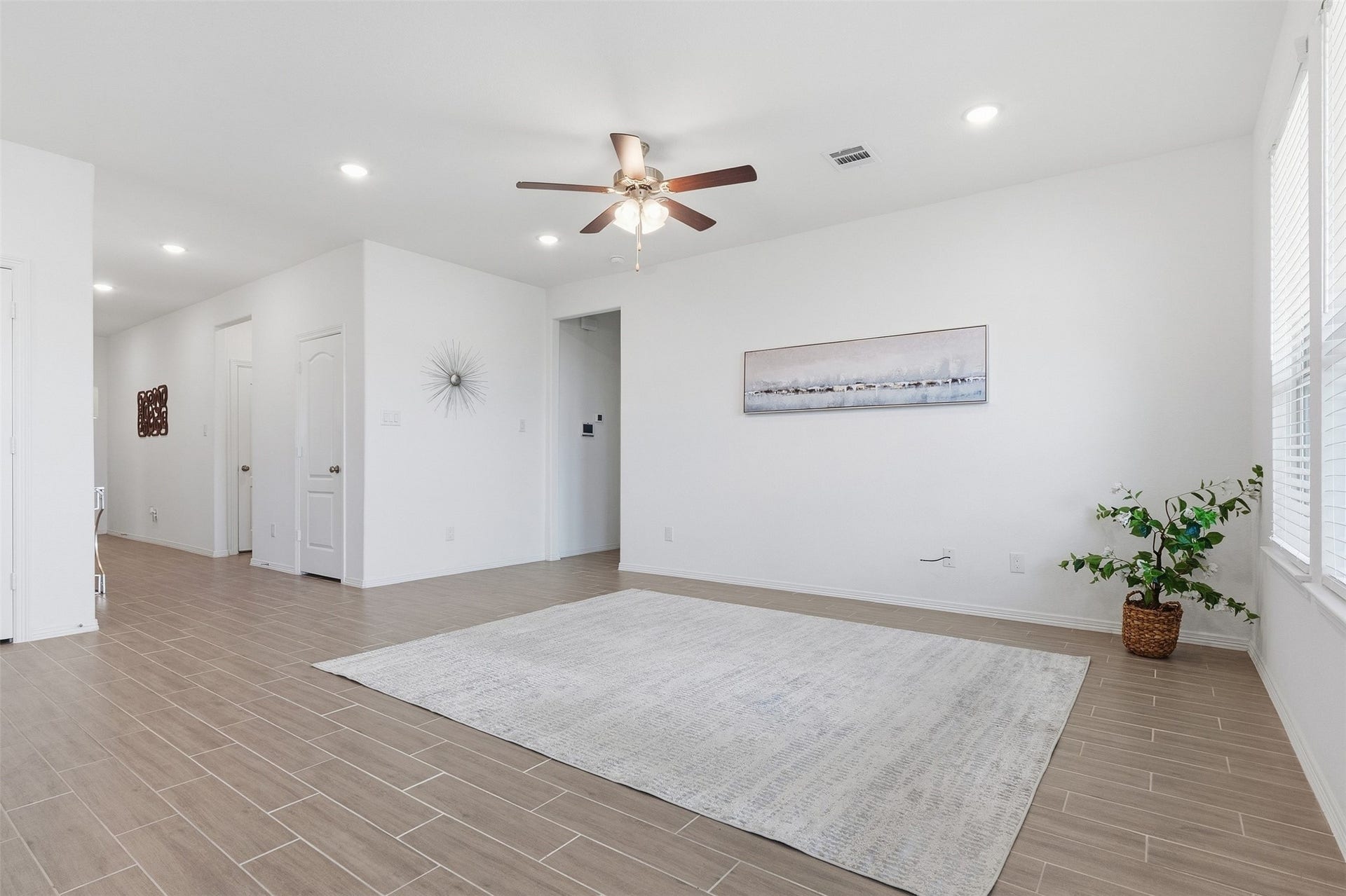 25814 Northpark Pine Drive, Porter, TX 77365 Open concept living space flows into the kitchen and casual dining space.