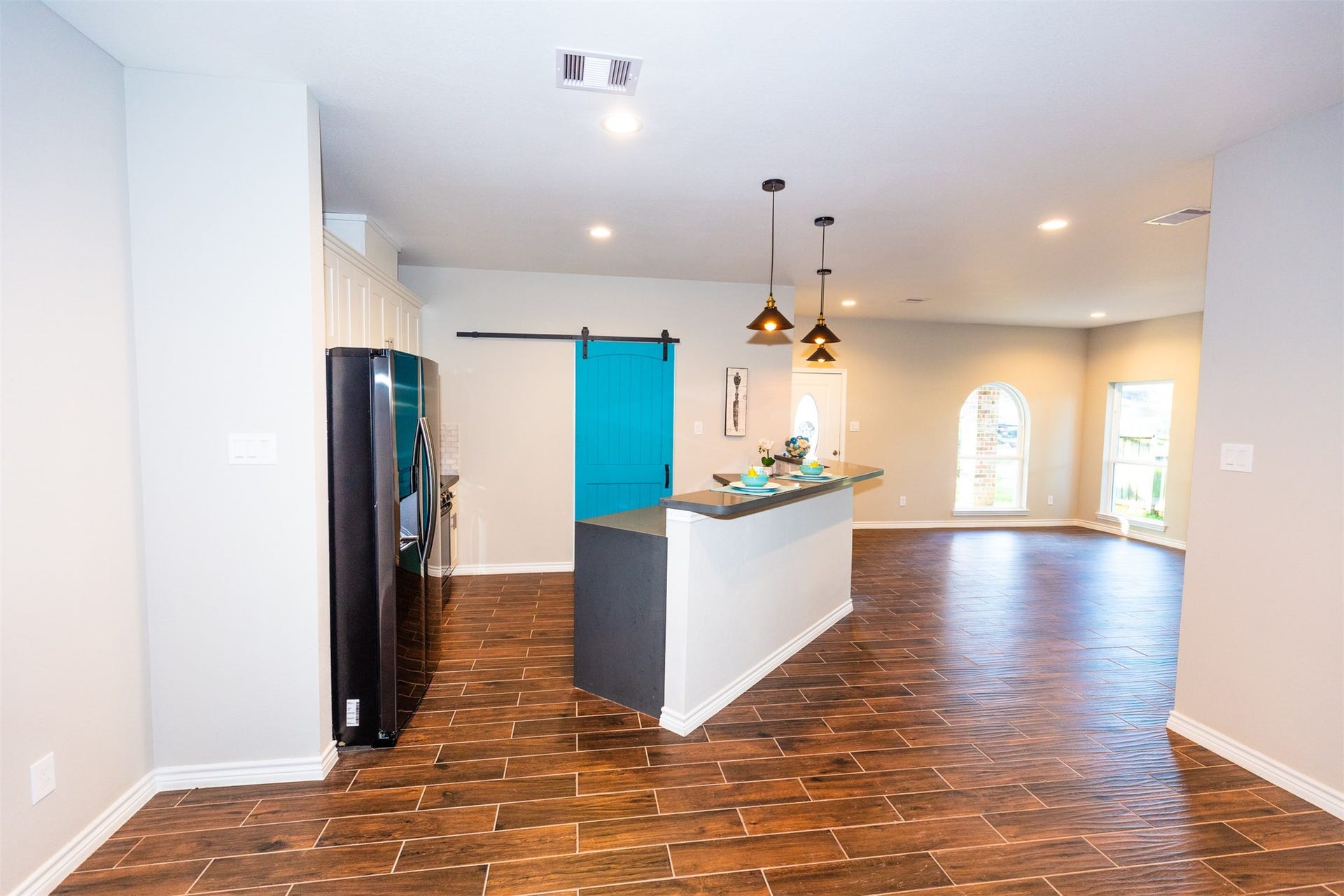 507 E Foley Street, Alvin, TX 77511 Ceramic tile floor throughout. (View from the dining room)