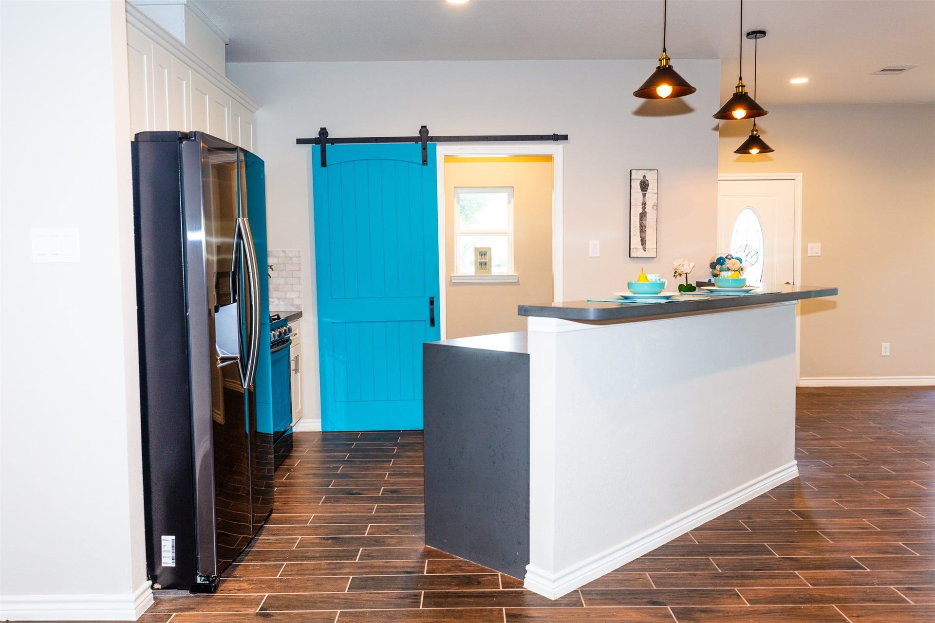 507 E Foley Street, Alvin, TX 77511 Fully functional Barn door and window in the pantry room for more light!
