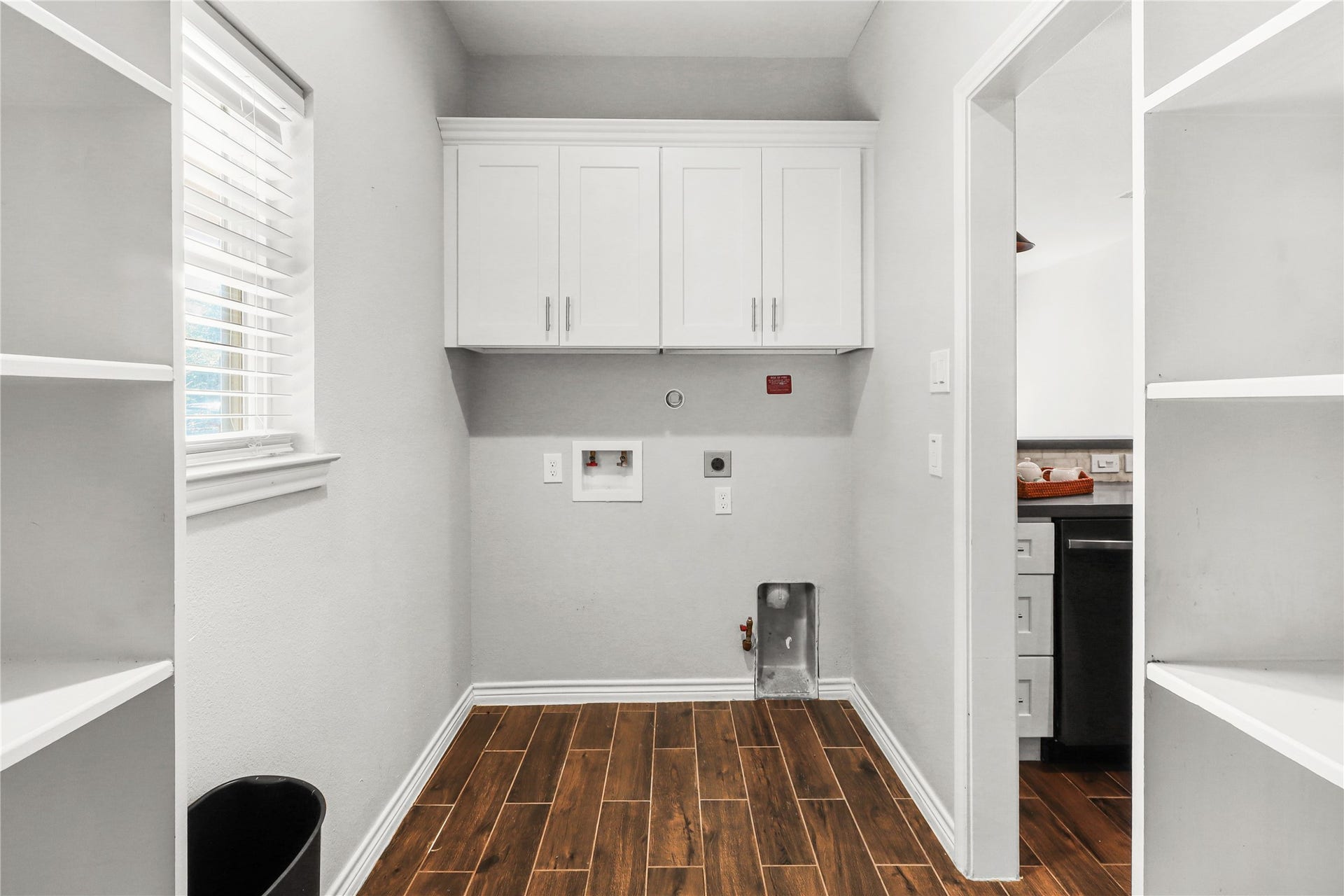 507 E Foley Street, Alvin, TX 77511 Second part of Pantry/ Utility room. Dryer can be gas or electric. Soft close cabinets above washer and dryer for more storage.