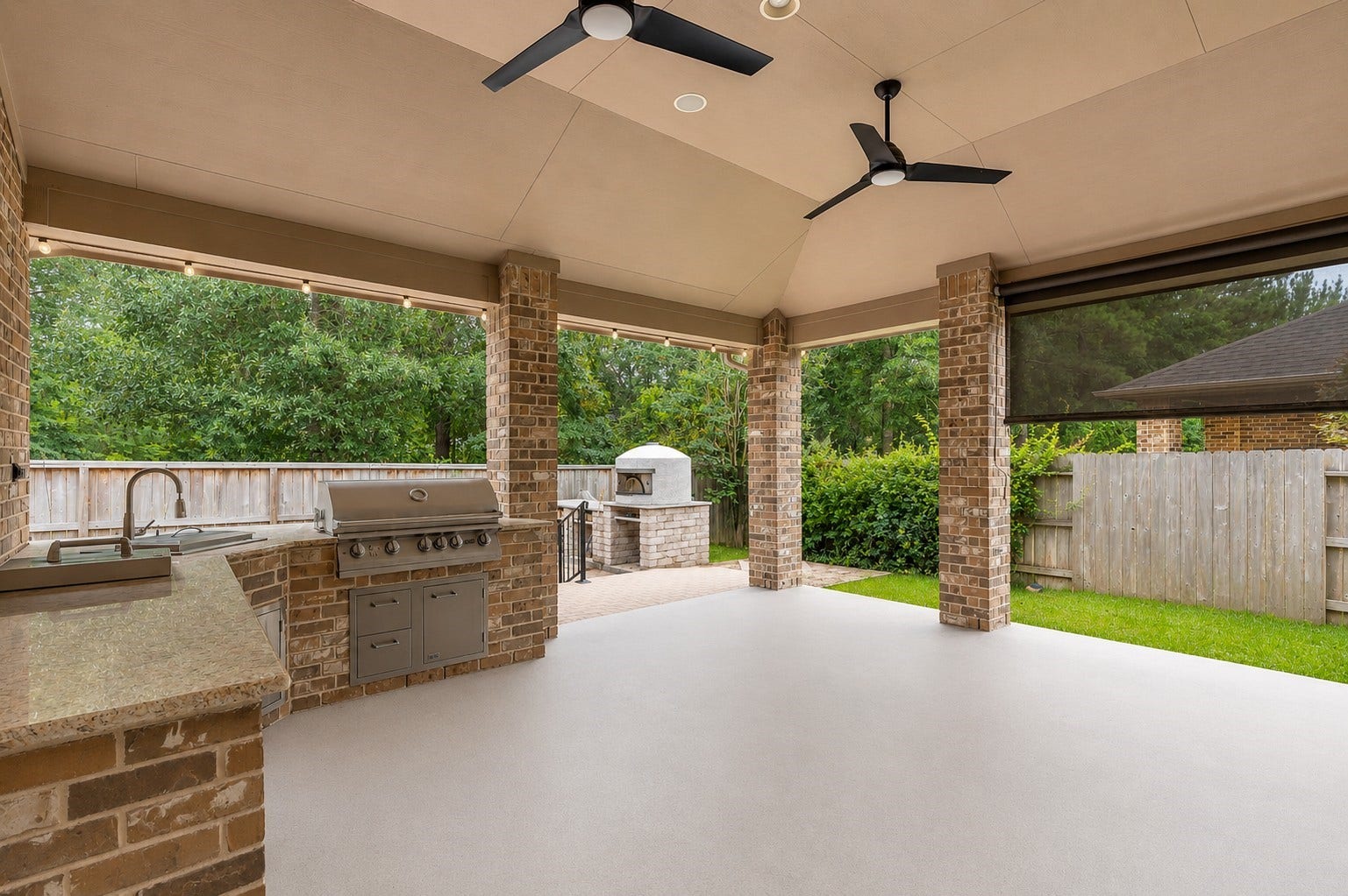 Outdoor kitchen is perfect for entertaining or relaxing. No back neighbors
