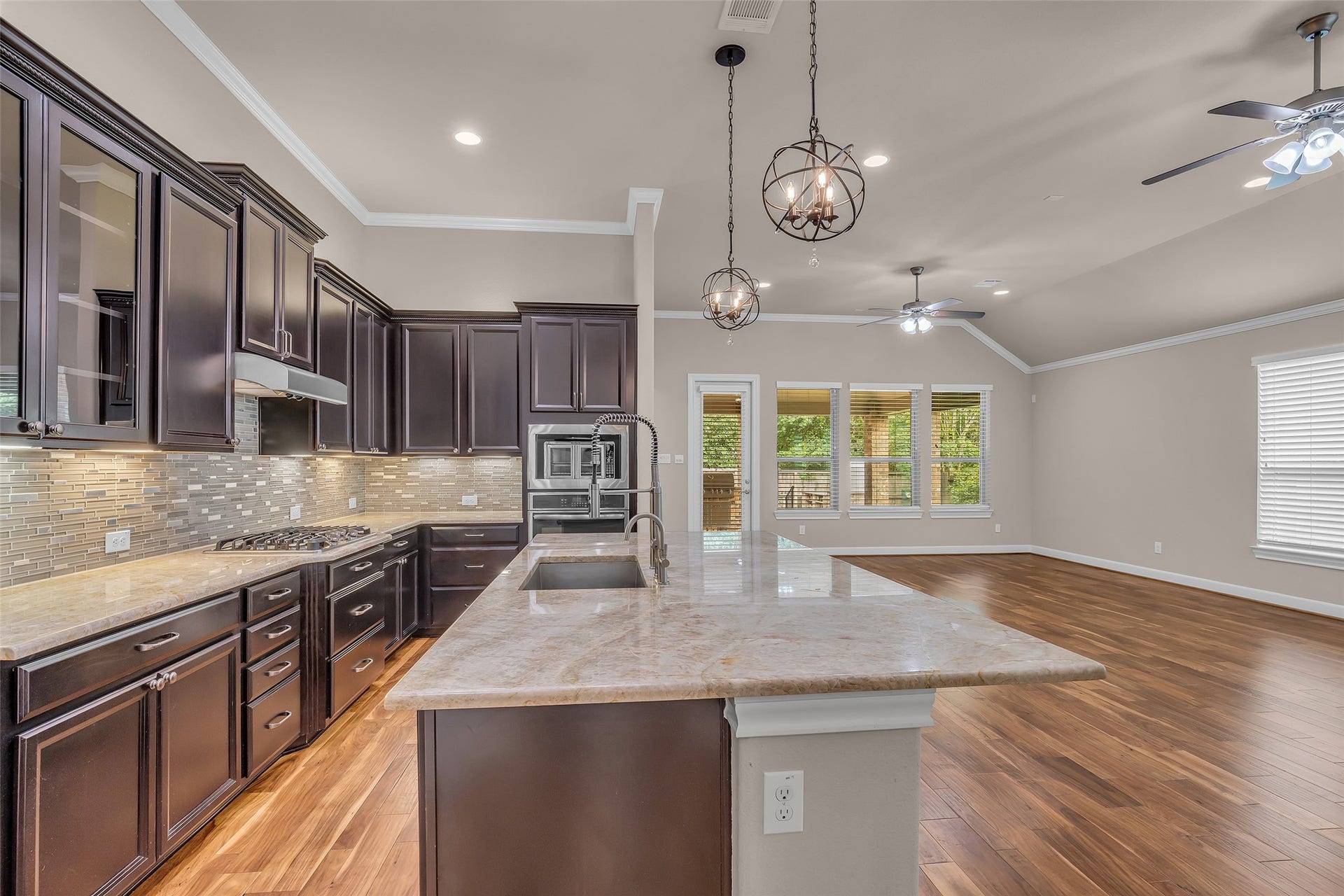 Kitchen island includes breakfast bar