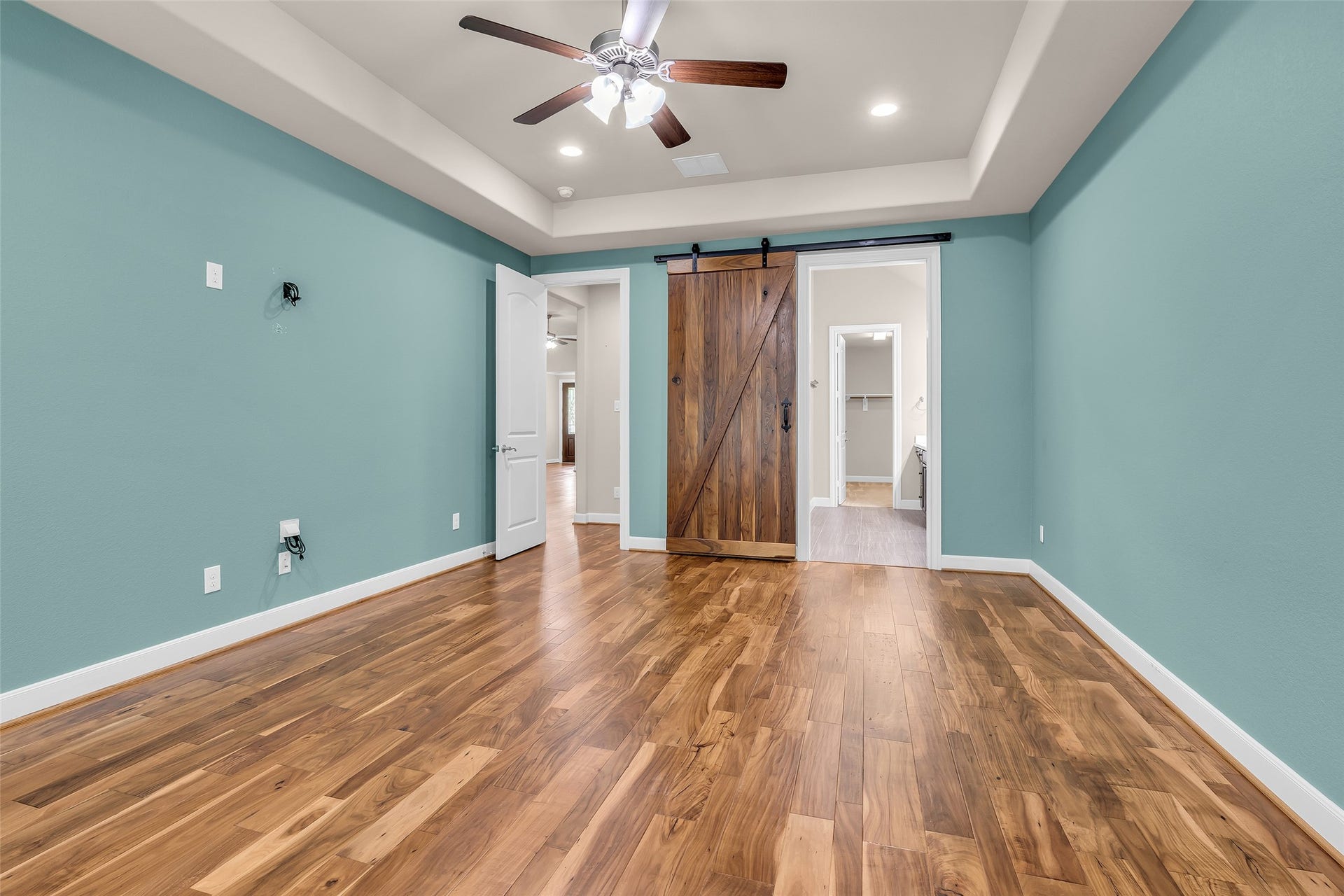 Barn Door leads to Primary bath