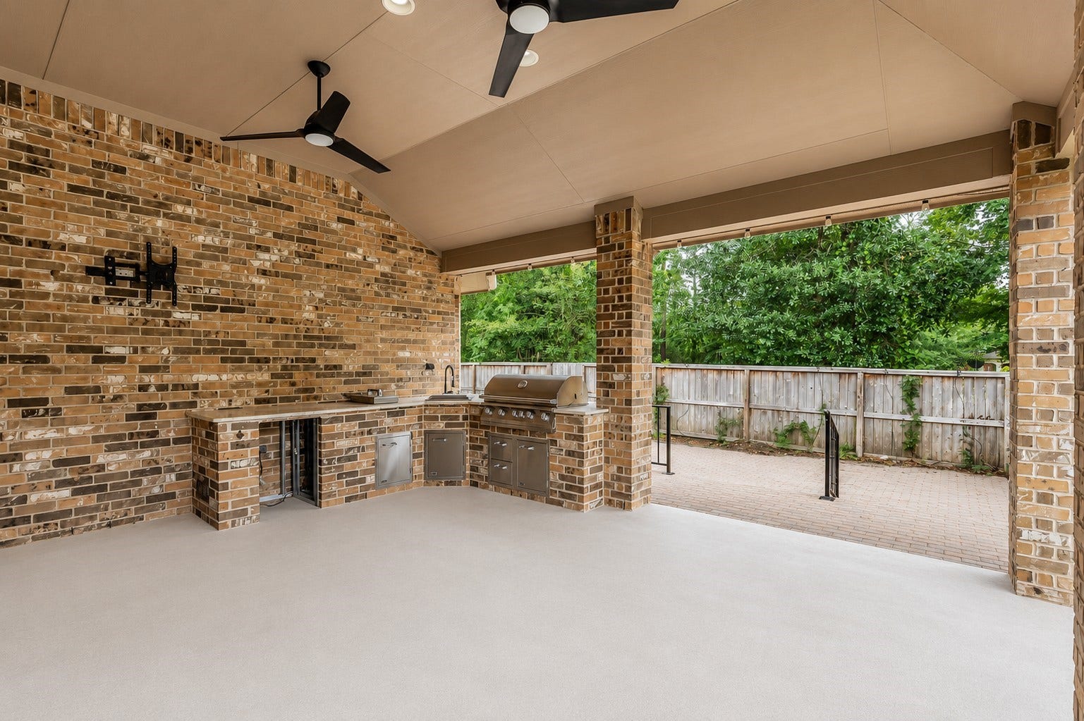 Outdoor kitchen is perfect for entertaining or relaxing. No back neighbors