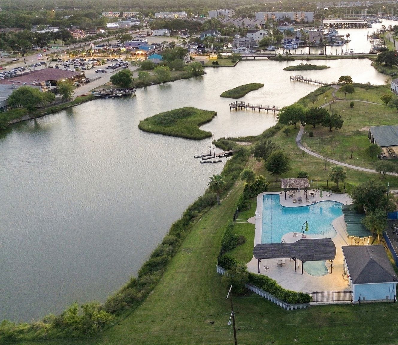 14 Harbor Lane, Kemah, TX 77565 The neighborhood has a pool, several parks and a kayak dock.