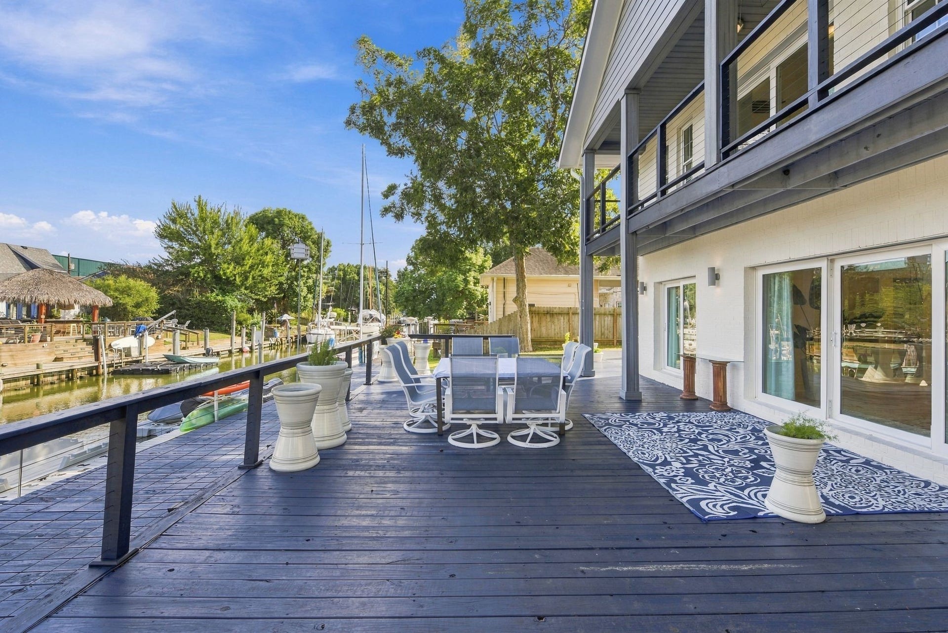 14 Harbor Lane, Kemah, TX 77565 This view of the front porch shows how large it is.