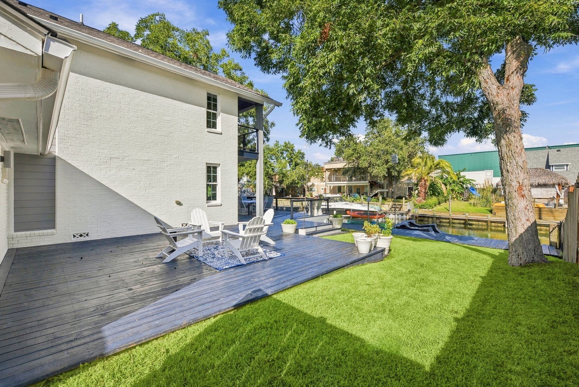 14 Harbor Lane, Kemah, TX 77565 The side porch and yard off of the primary Suite has plenty of room if you would like to build a pool.