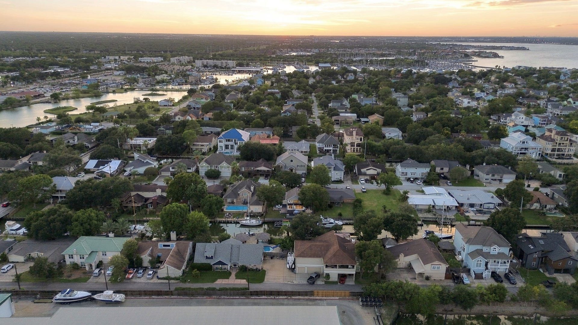 14 Harbor Lane, Kemah, TX 77565 The home is located on a deep water access canal which flows into clear lake and beyond.