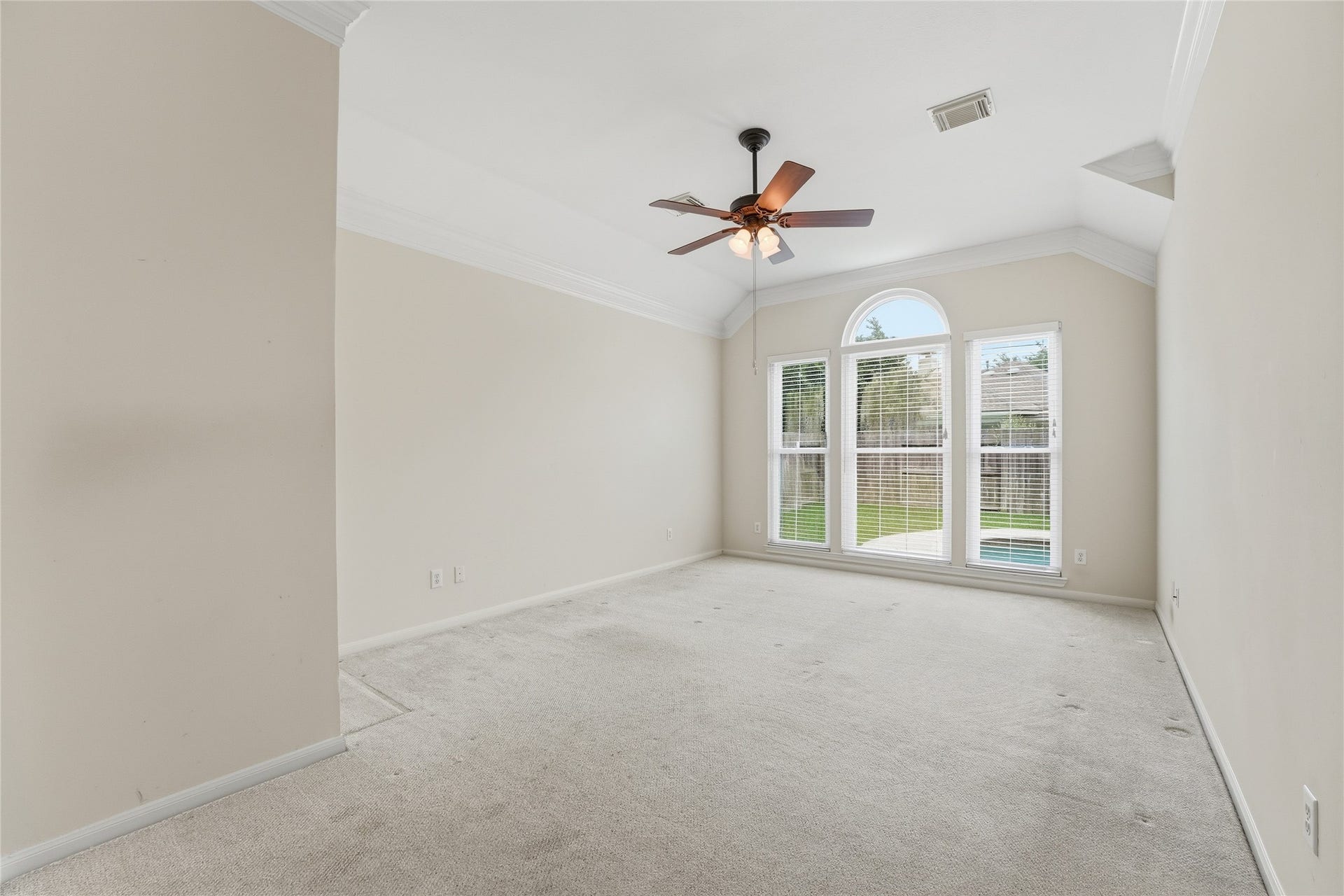 8027 Summer Brook Court, Sugar Land, TX 77479 Primary bedroom with a view of the pool