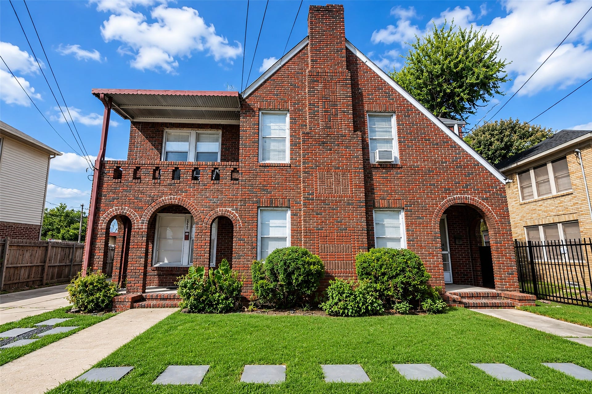 With versatile living spaces and a distinctive layout, this property presents an excellent opportunity for homeowners or investors.