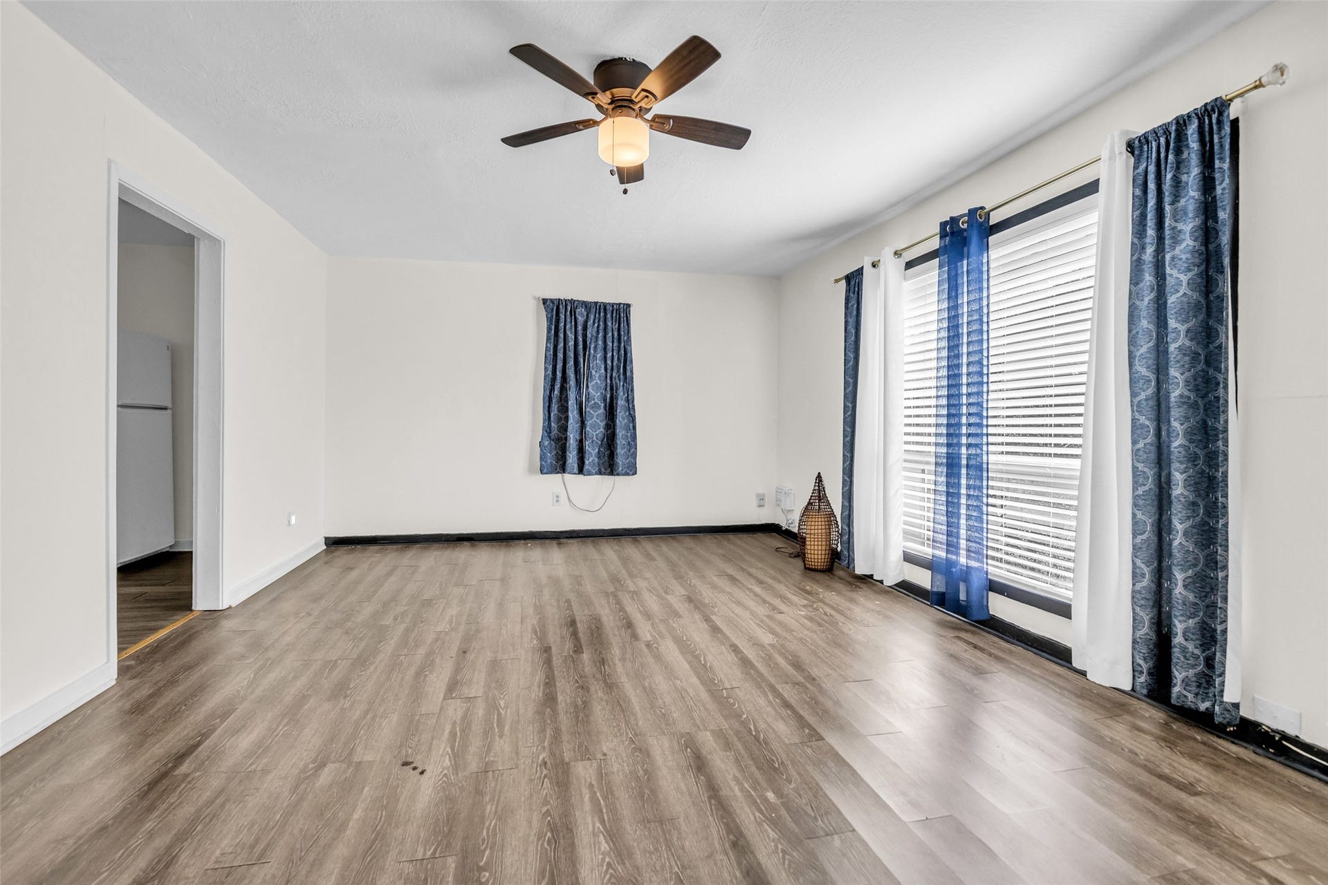 An additional view of the second-floor living room highlights its generous size, with plenty of open space for comfortable seating, furnishings, and everyday living.