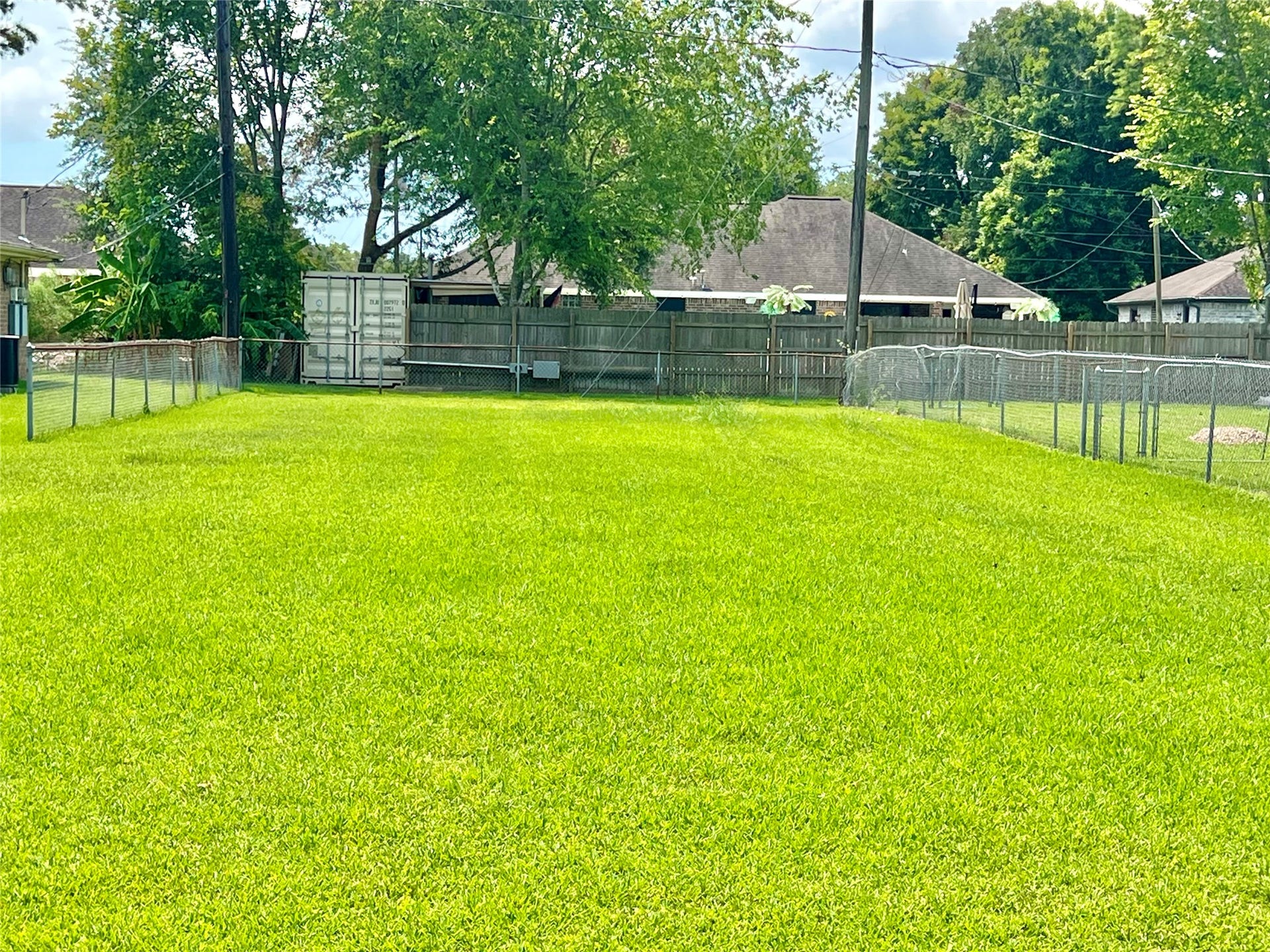 11815 15th Street, Santa Fe, TX 77510 Not only does this home have an oversized fenced back yard, but you also have this entire lot to the left as well!