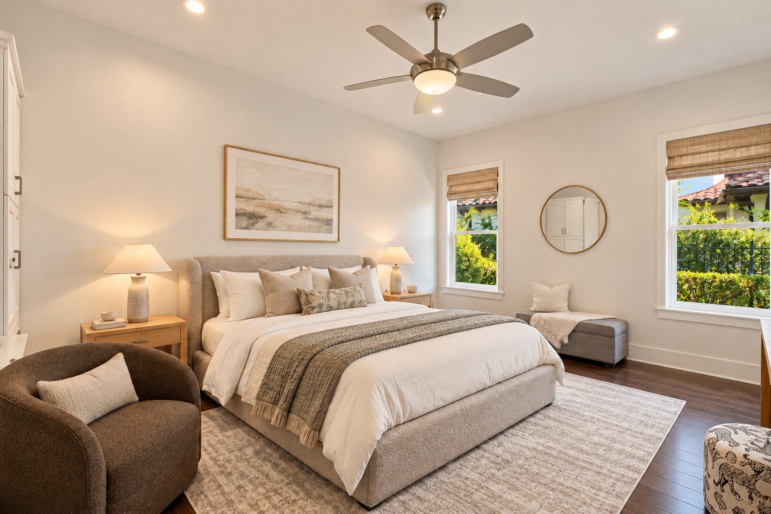 46 Lamerie Way, The Woodlands, TX 77382 Second primary suite on the first floor, featuring serene lake views, a private en-suite bath, and a spacious walk-in closet.