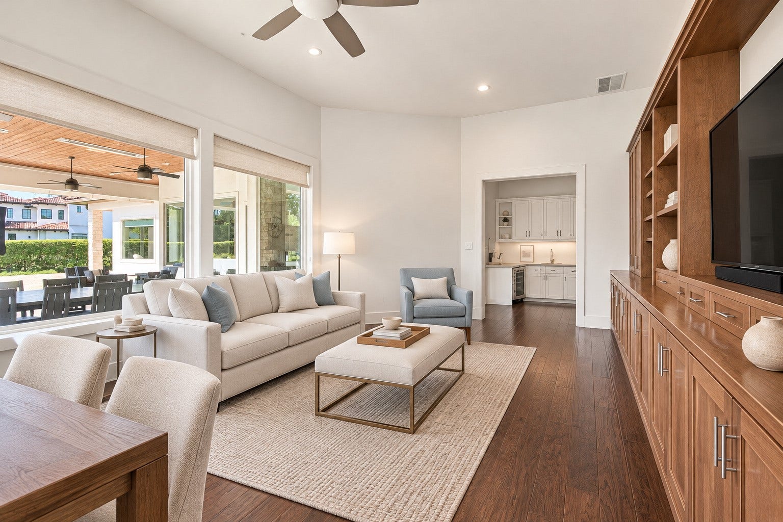 46 Lamerie Way, The Woodlands, TX 77382 Game room featuring beautiful hardwood floors, custom built-ins, and an abundance of natural light. A comfortable and inviting space perfect for entertaining, relaxing, or enjoying time with family and friends.