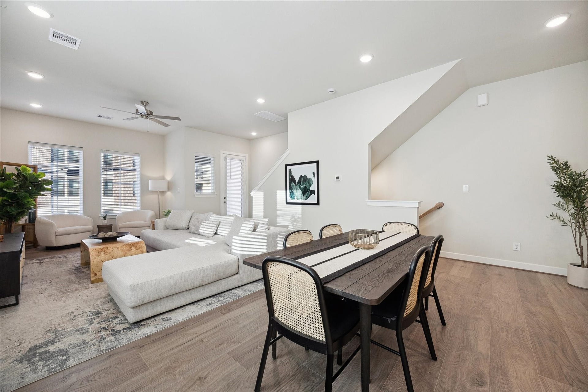 3083 Hicks Street, Houston, TX 77007 Representative photo showing the communitys model home living room. Layout and selections may vary.