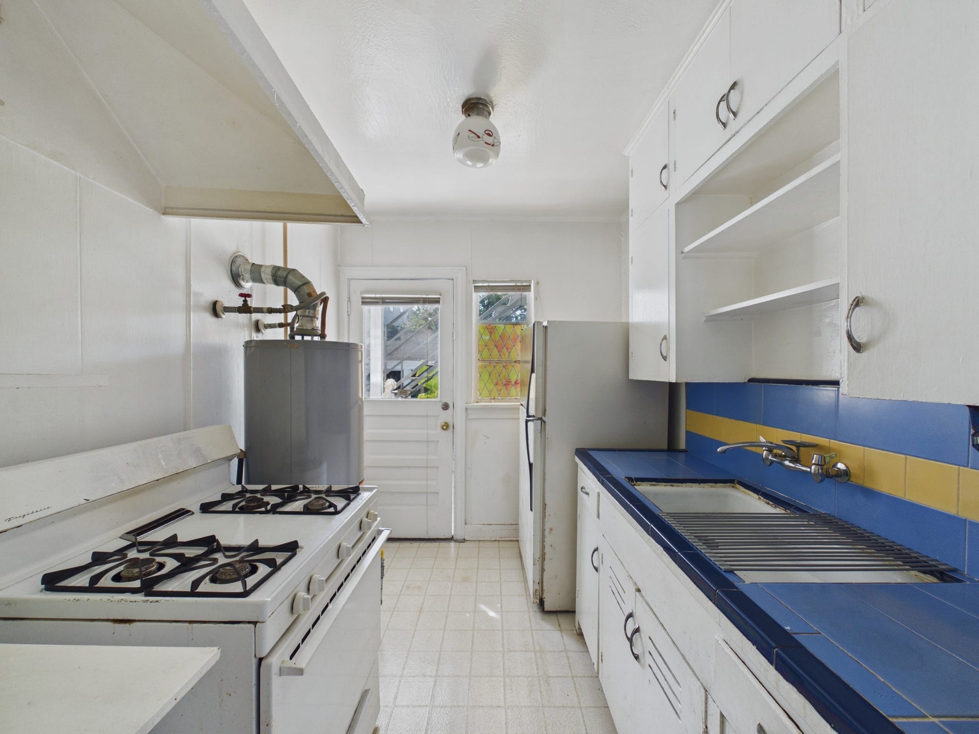 Gas Range, Large Sink & Refrigerator