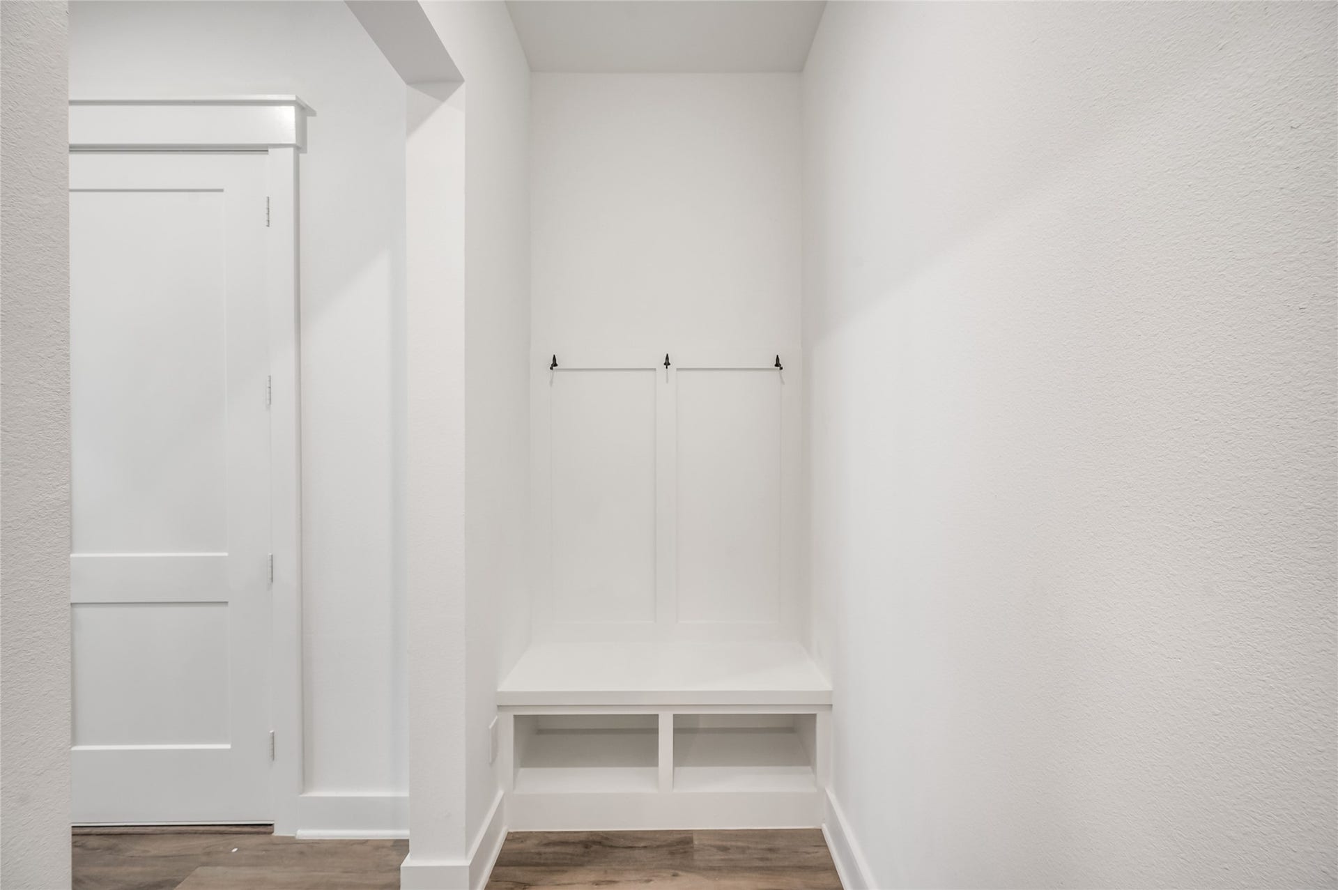 4605 Terry Street, Houston, TX 77009 A charming built in bench with hooks by the garage entry makes for the perfect everyday drop zone