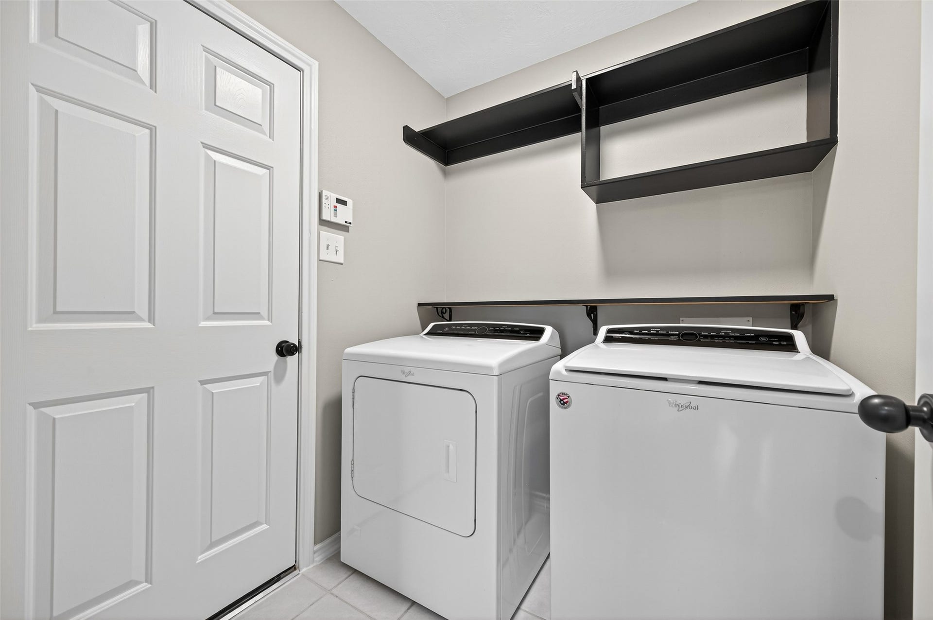 21914 Bronze Leaf Drive, Cypress, TX 77433 Laundry Room with washer & gas dryer (included) located off the garage