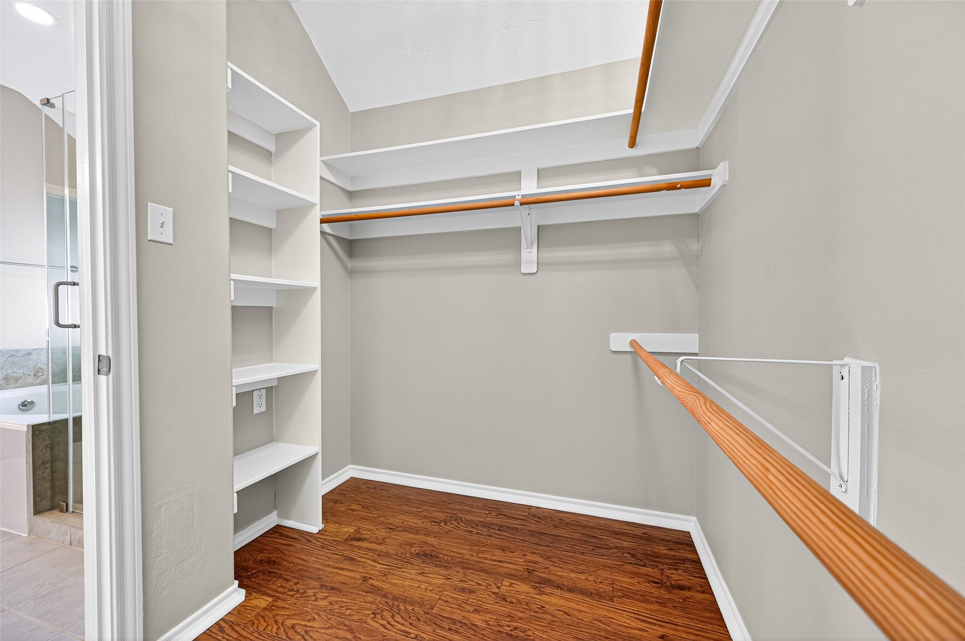 21914 Bronze Leaf Drive, Cypress, TX 77433 Large walk in closet with built in shelving and tons of storage