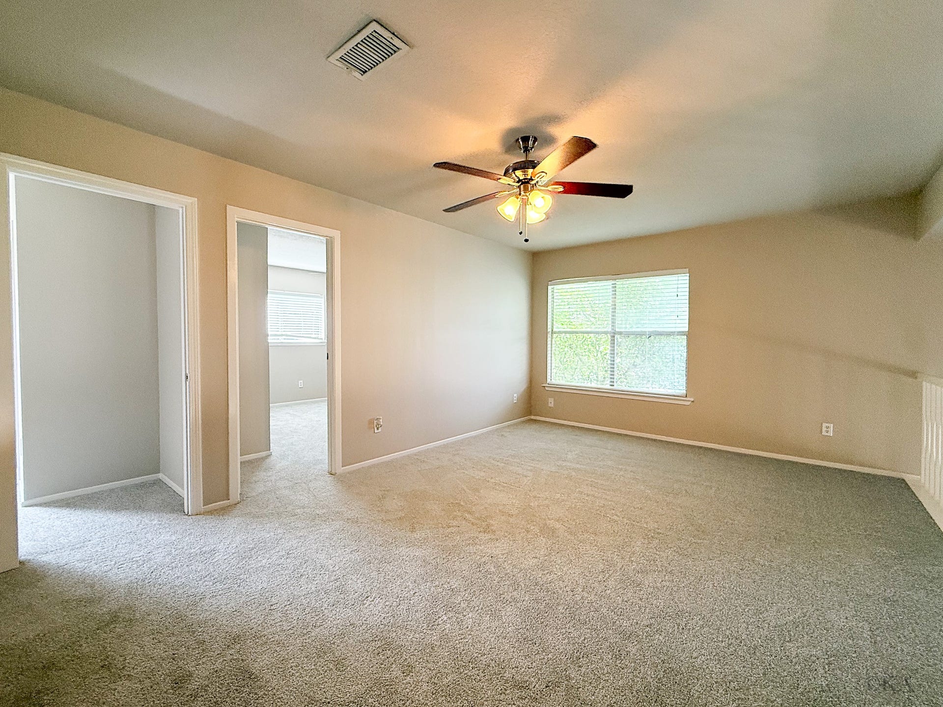 Loft style gameroom upstairs leads to the secondary bedrooms.