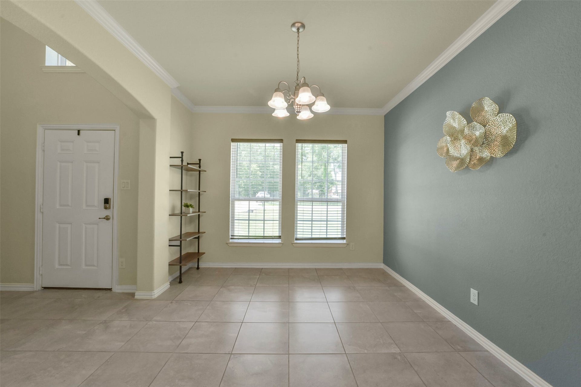 82 Road 6607, Dayton, TX 77535 In the pic you see the back of the front door and the formal dining area with big windows. 82 Road 6607, Dayton TX 77535