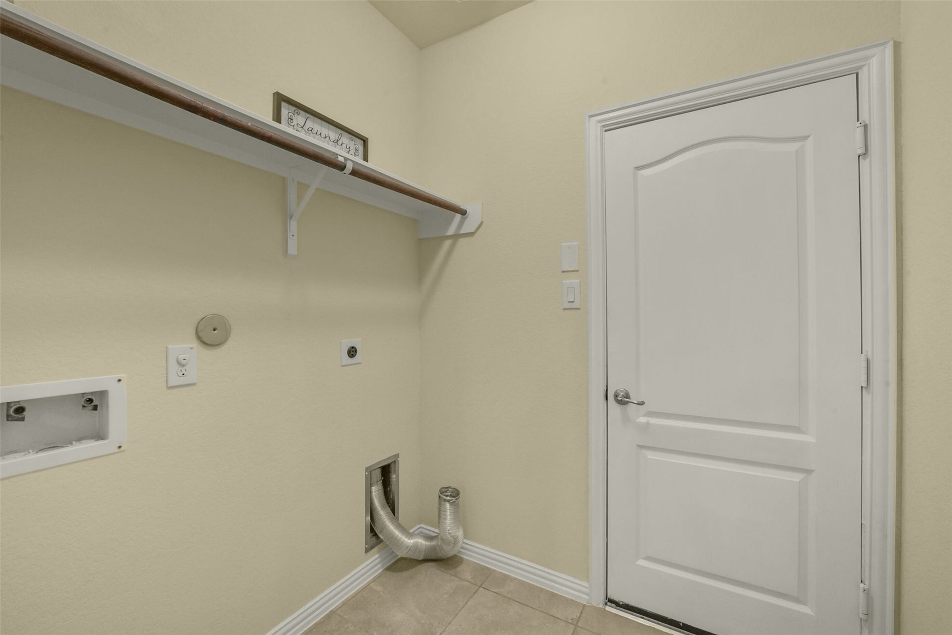 82 Road 6607, Dayton, TX 77535 Laundry downstairs and the door opens to the 3-car garage. This is also close to the primary bedroom. 82 Road 6607, Dayton TX 77535
