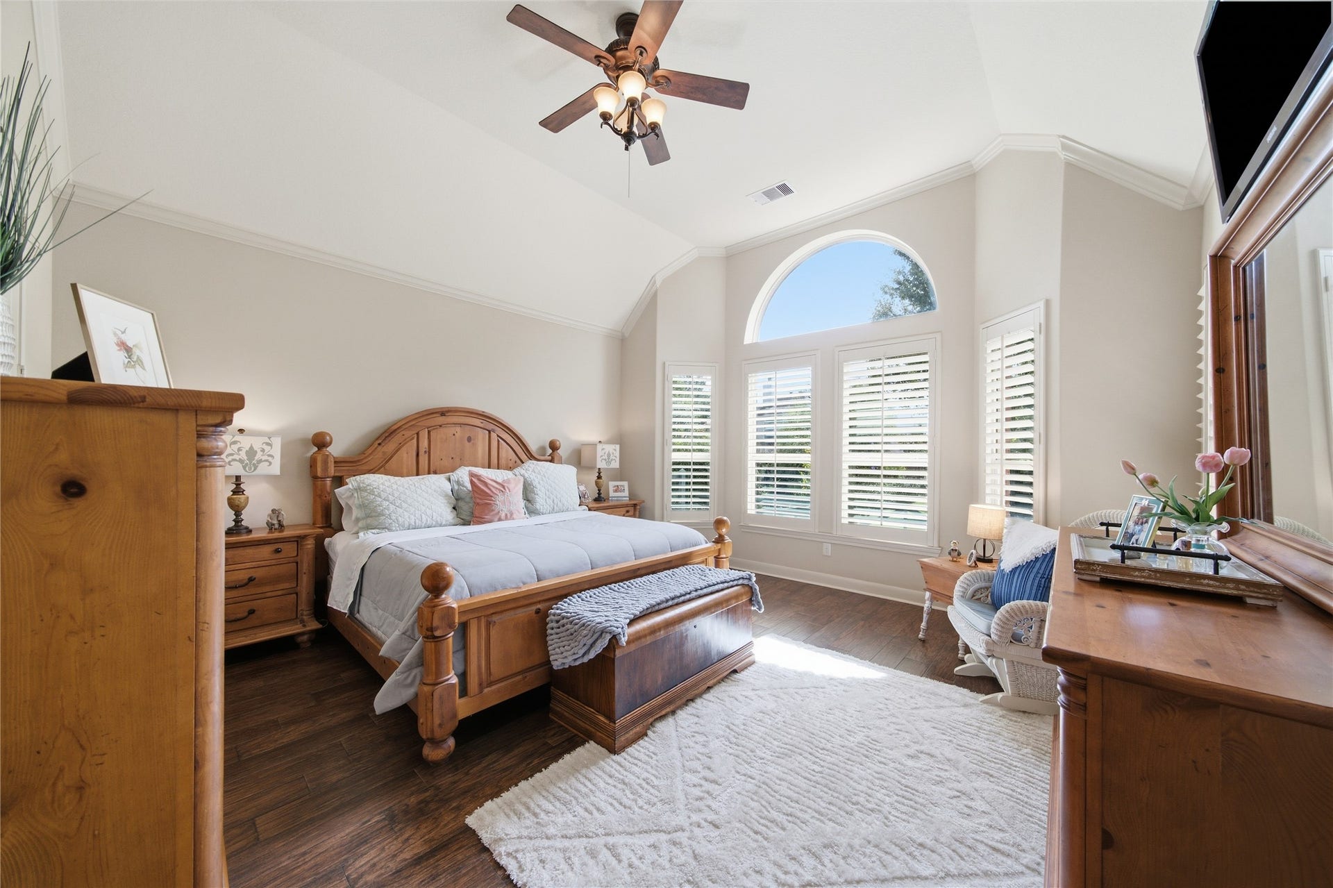 30511 Sethora Hill Way, Fulshear, TX 77441 Spacious and filled with beautiful natural light, the primary bedroom offers a peaceful place to unwind, settle in with a good book, and rest at the end of the day.
