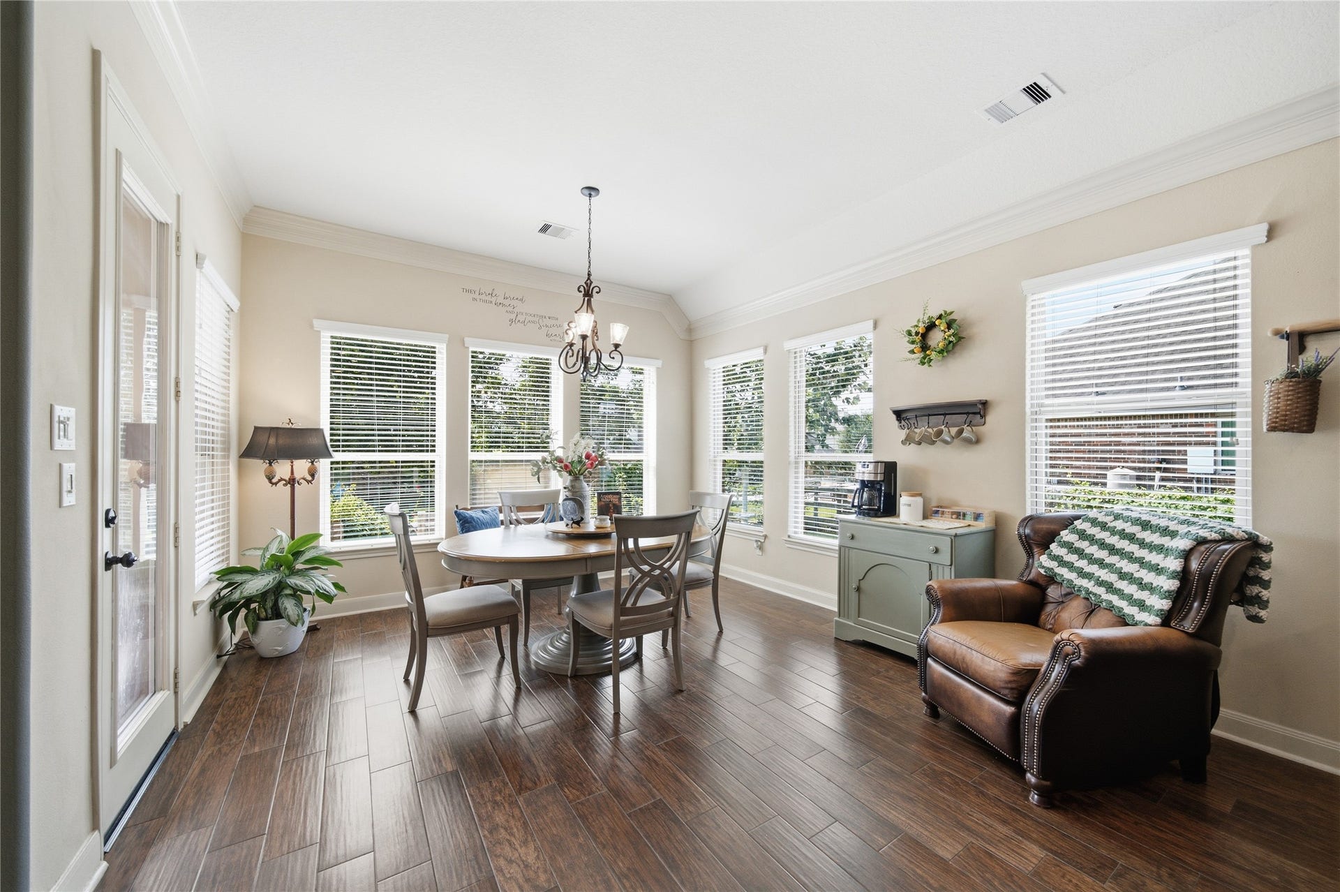 30511 Sethora Hill Way, Fulshear, TX 77441 Morning coffee, weekend breakfasts, and a table full of conversationthis spacious breakfast room offers room for family and guests to gather, with views of the beautifully landscaped backyard making every meal feel a little more special.