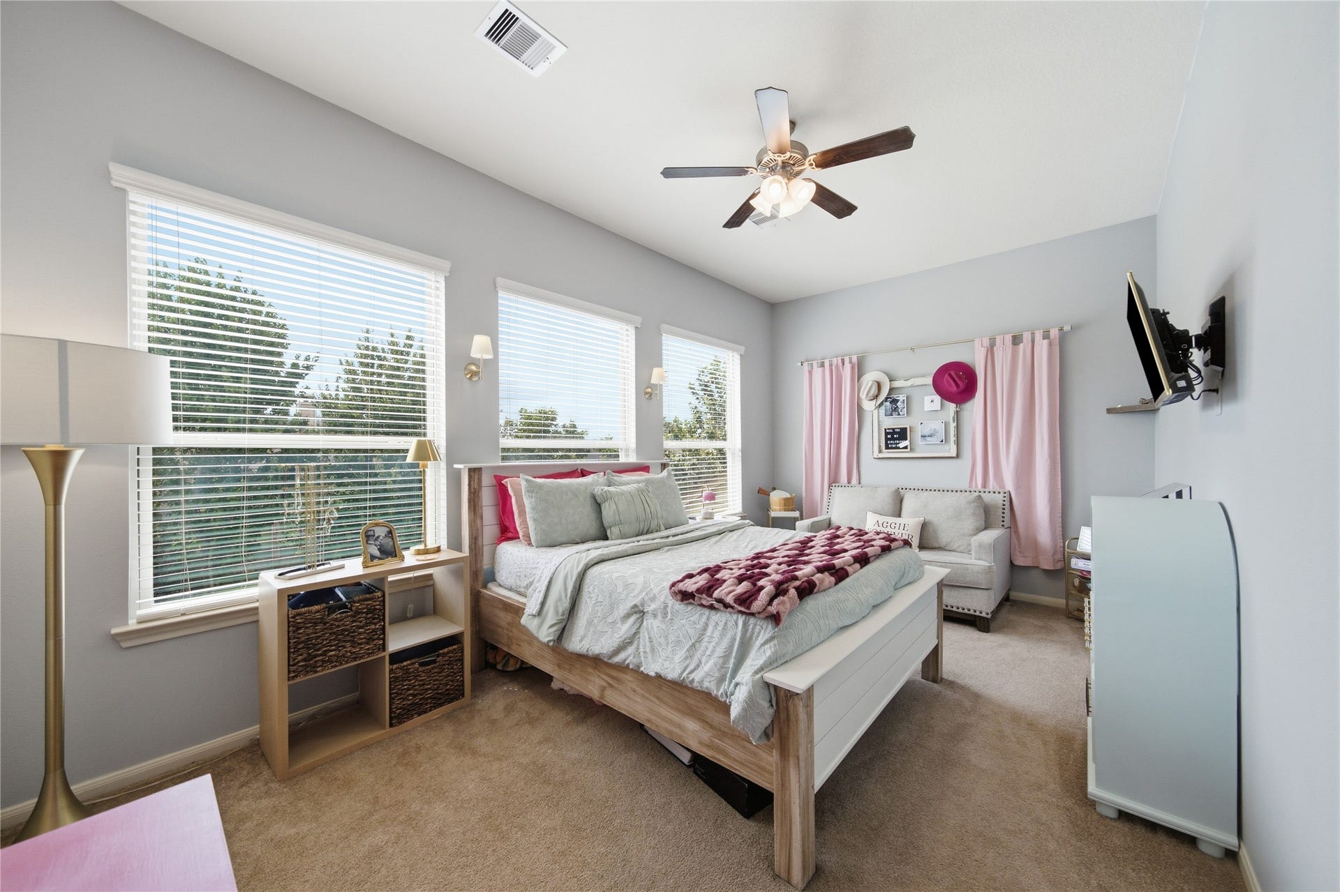 30511 Sethora Hill Way, Fulshear, TX 77441 A little space to call their ownthis upstairs secondary bedroom offers a welcoming retreat for older children or overnight guests, with a full bathroom nearby for added comfort and convenience.